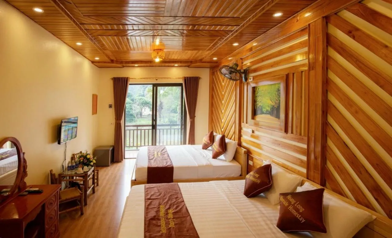 Bed in HoangLong Riverside Homestay