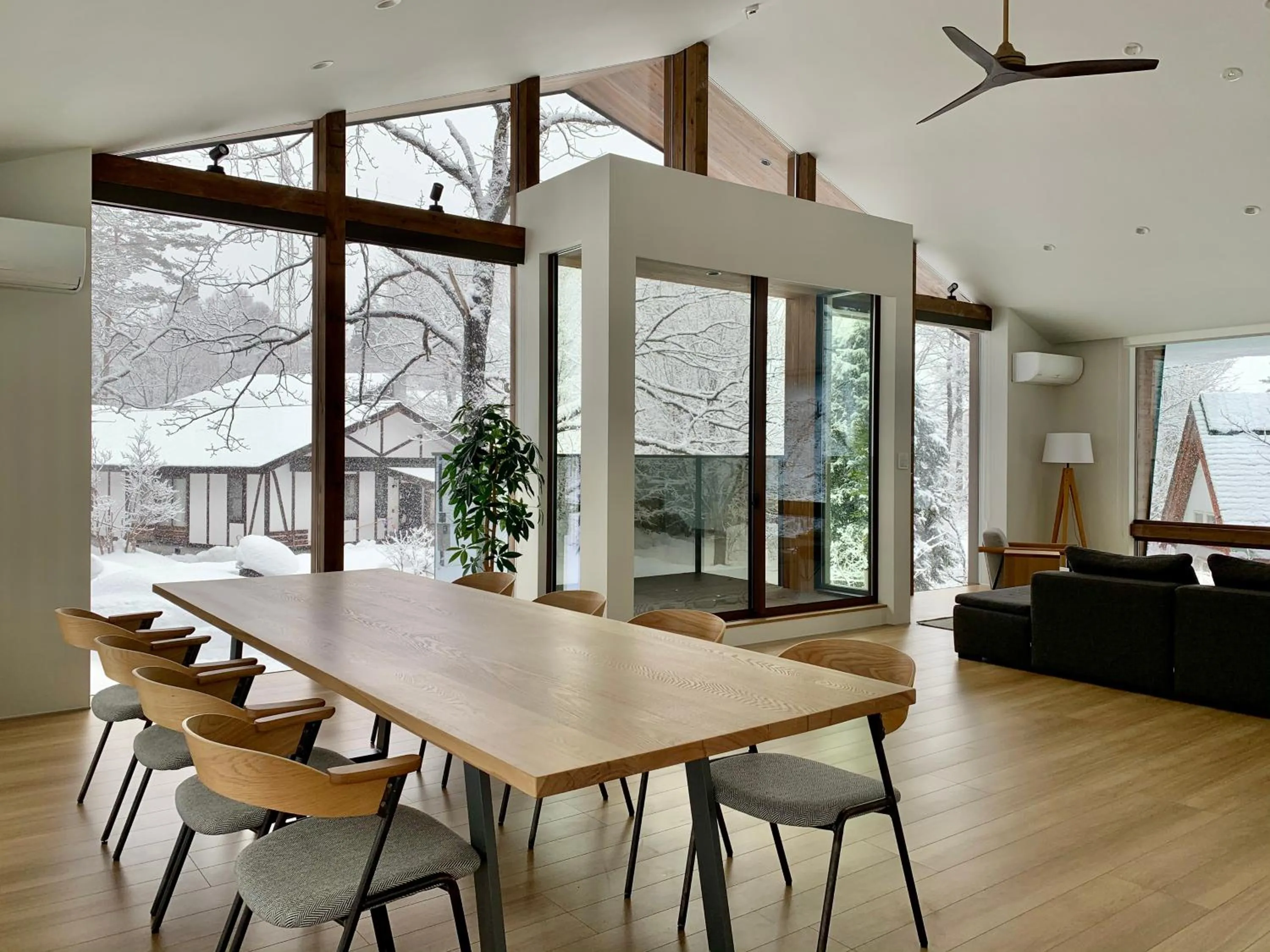 Dining area in Ahiru Chalet by Hakuba White Fox Company