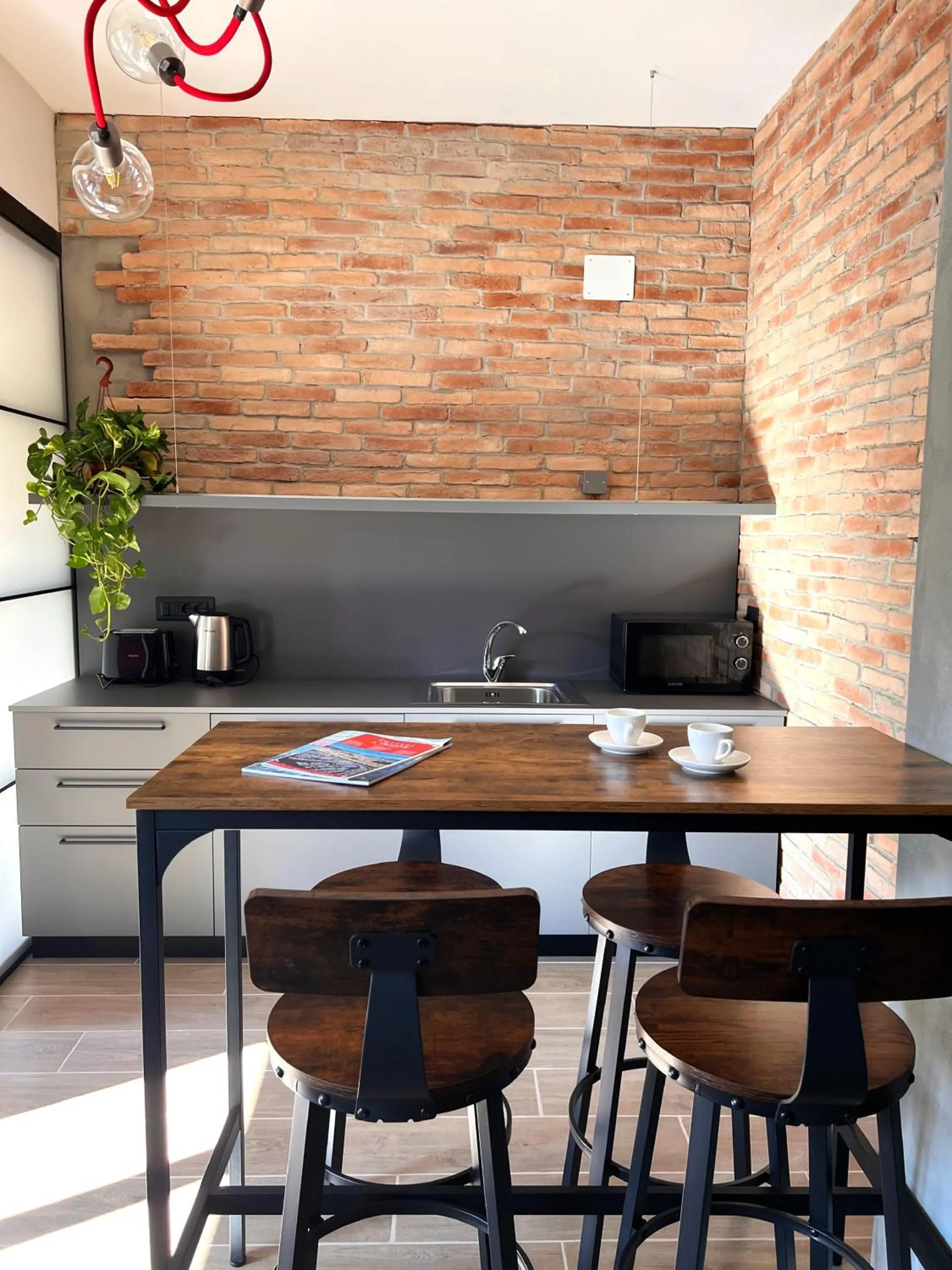 Kitchen or kitchenette in Hotello Trieste