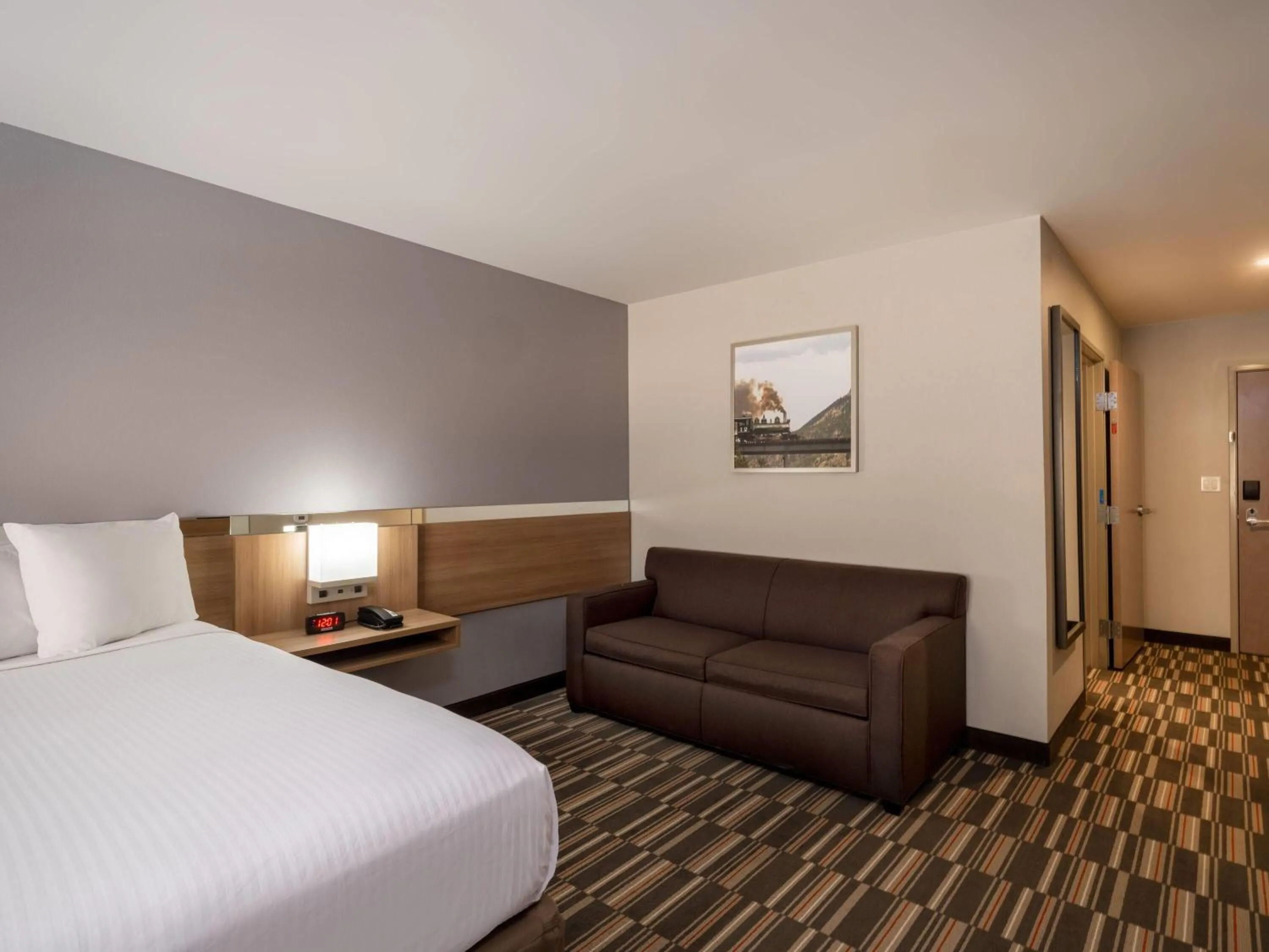 Photo of the whole room, Bed in Microtel Inn & Suites by Wyndham Georgetown Lake