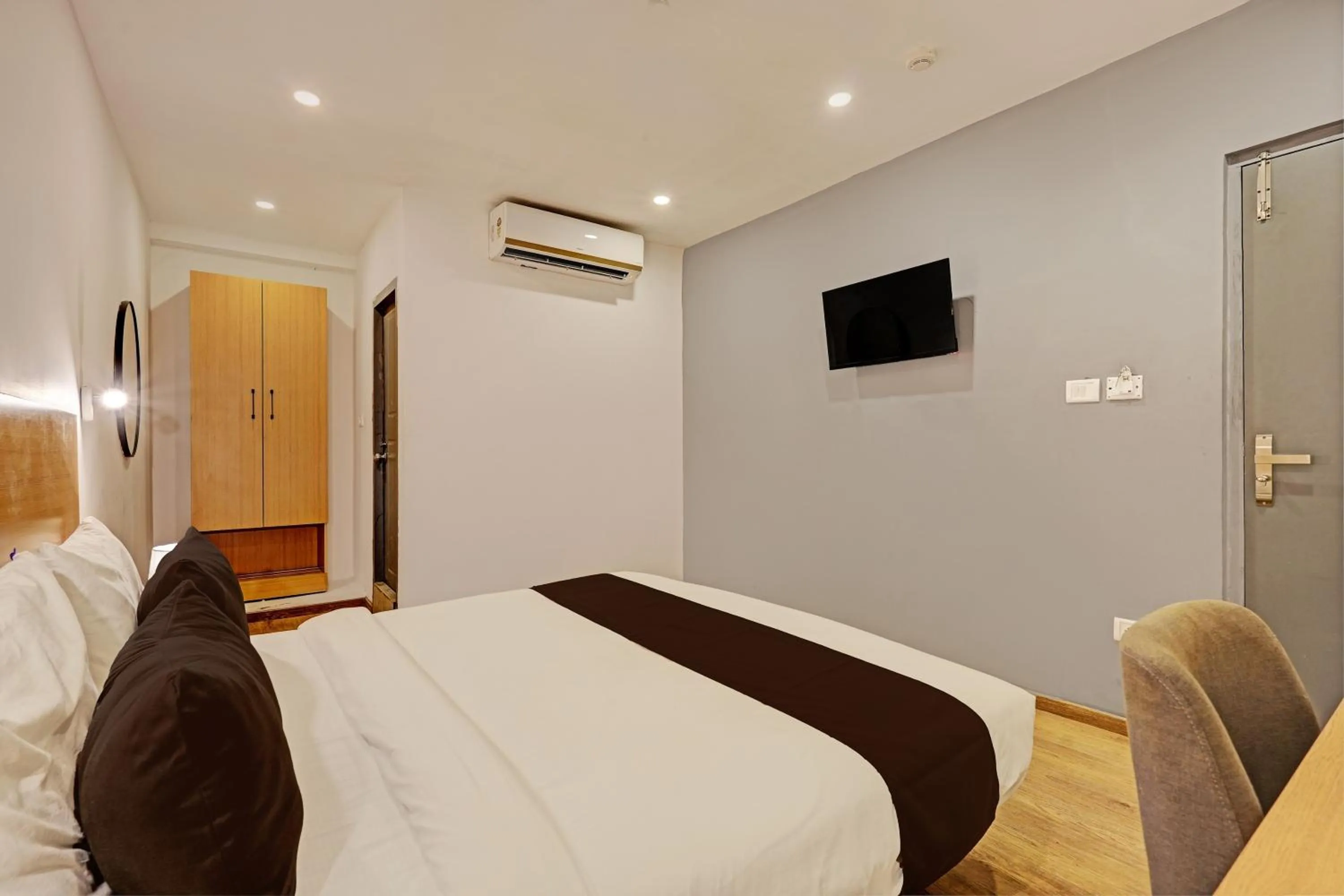 Bedroom, Bed in Super Townhouse Ramamurthy Nagar Formerly Navya International