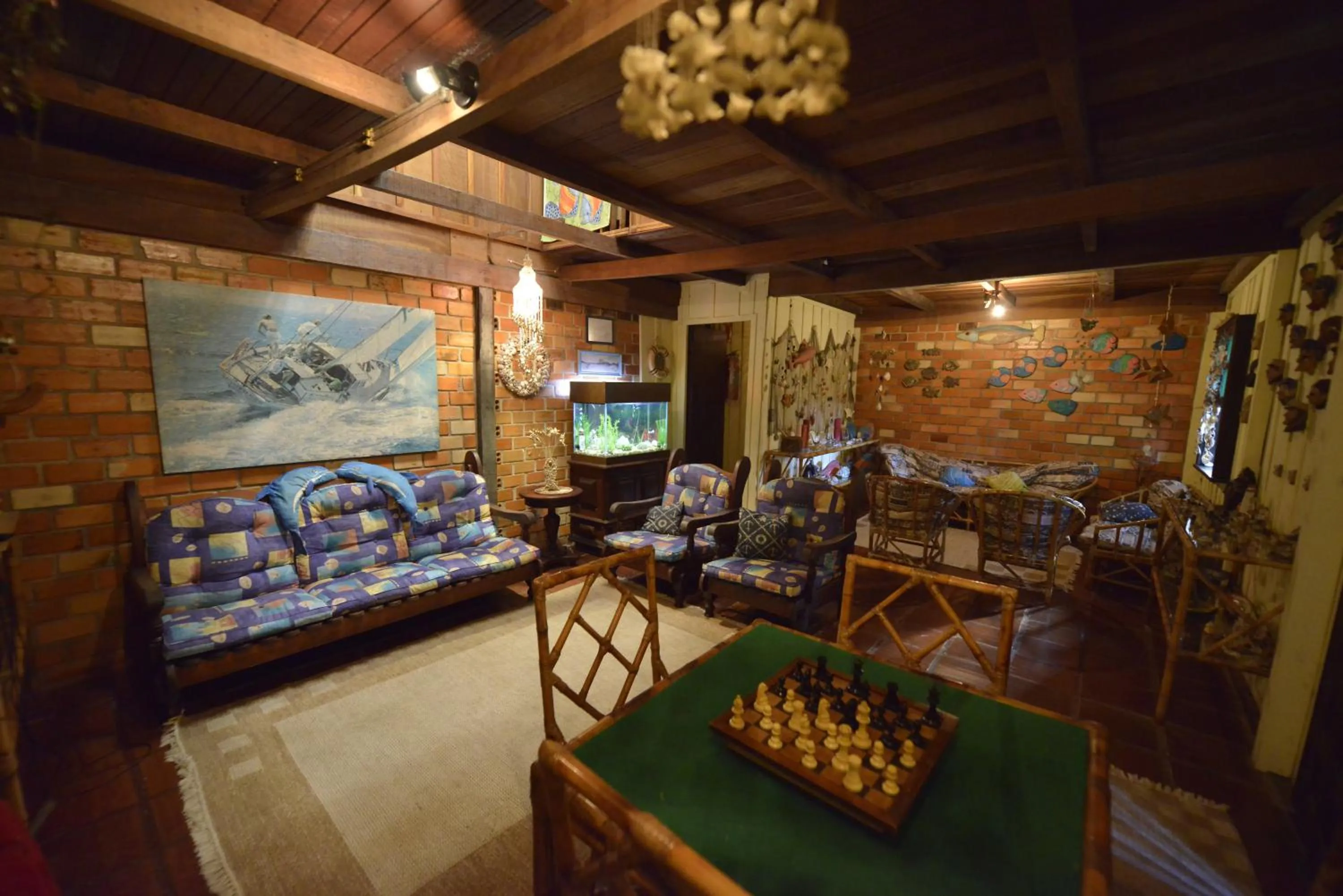 Communal lounge/ TV room in Hotel Pousada Praia do Farol