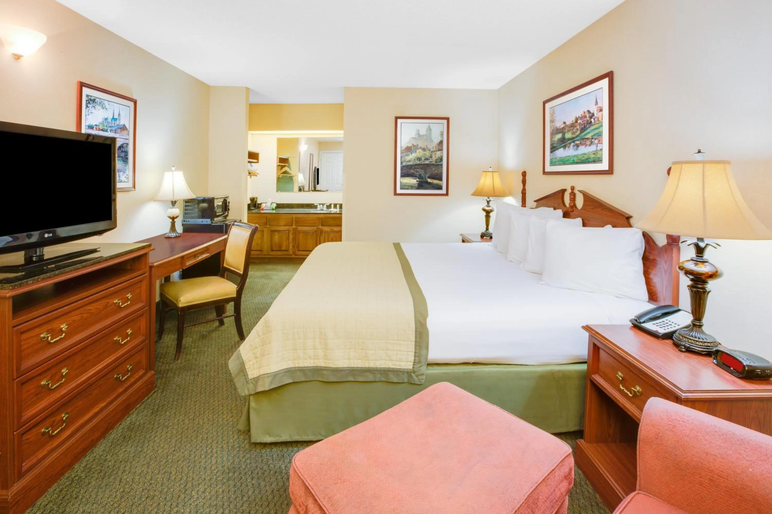 Bed in Baymont by Wyndham Ozark