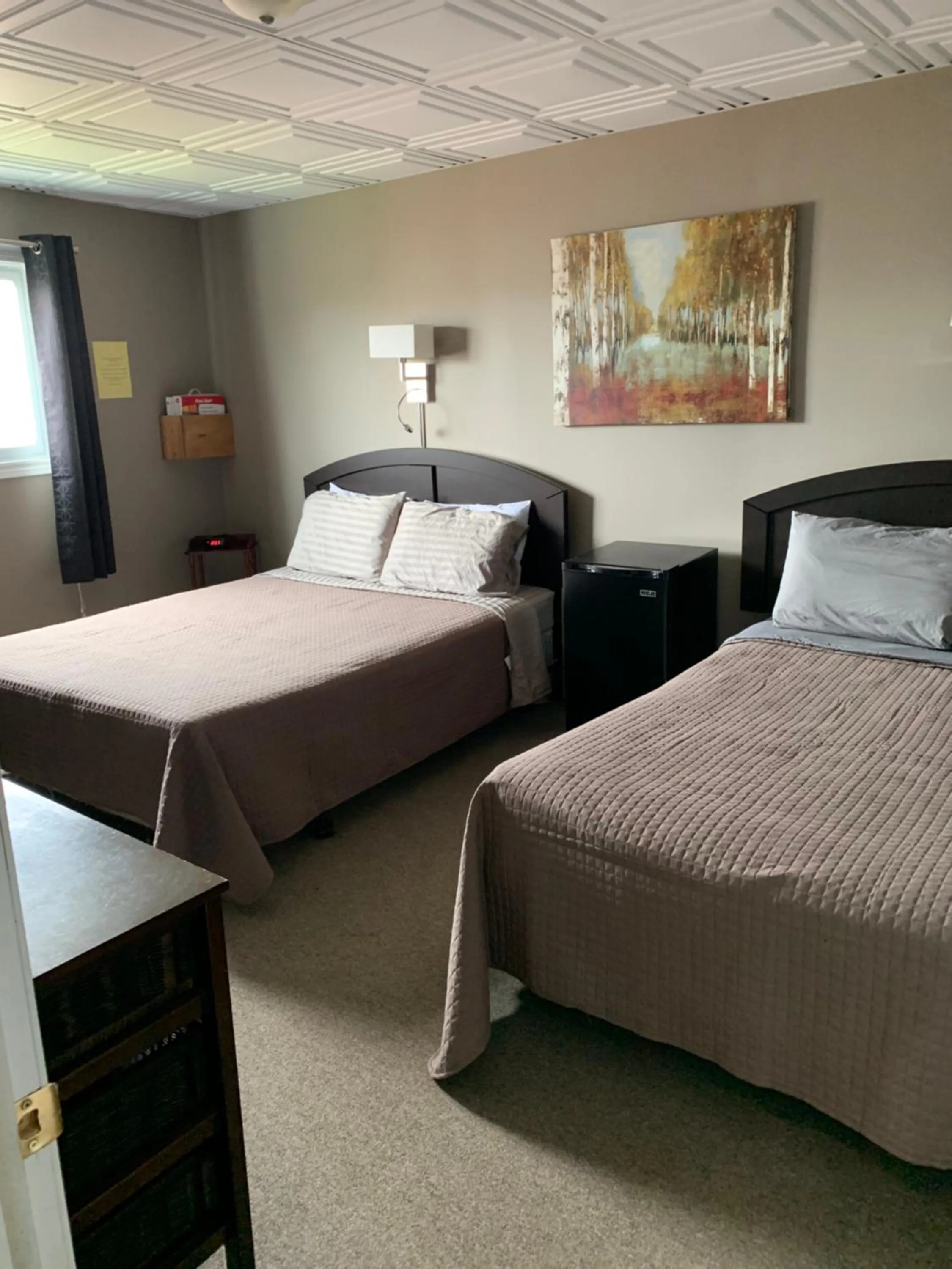 Bed in Exploits Inn and Suites