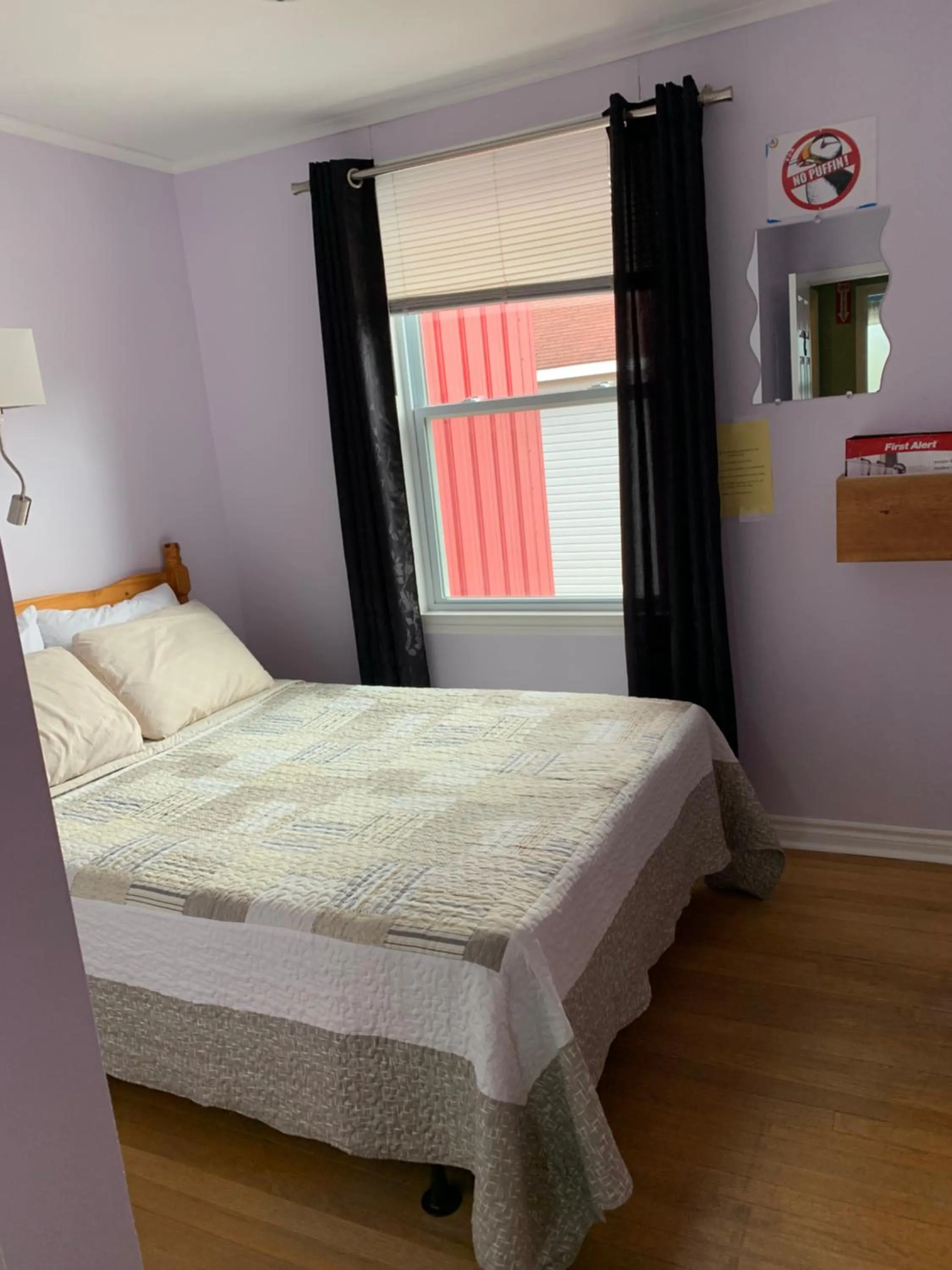 Bed in Exploits Inn and Suites