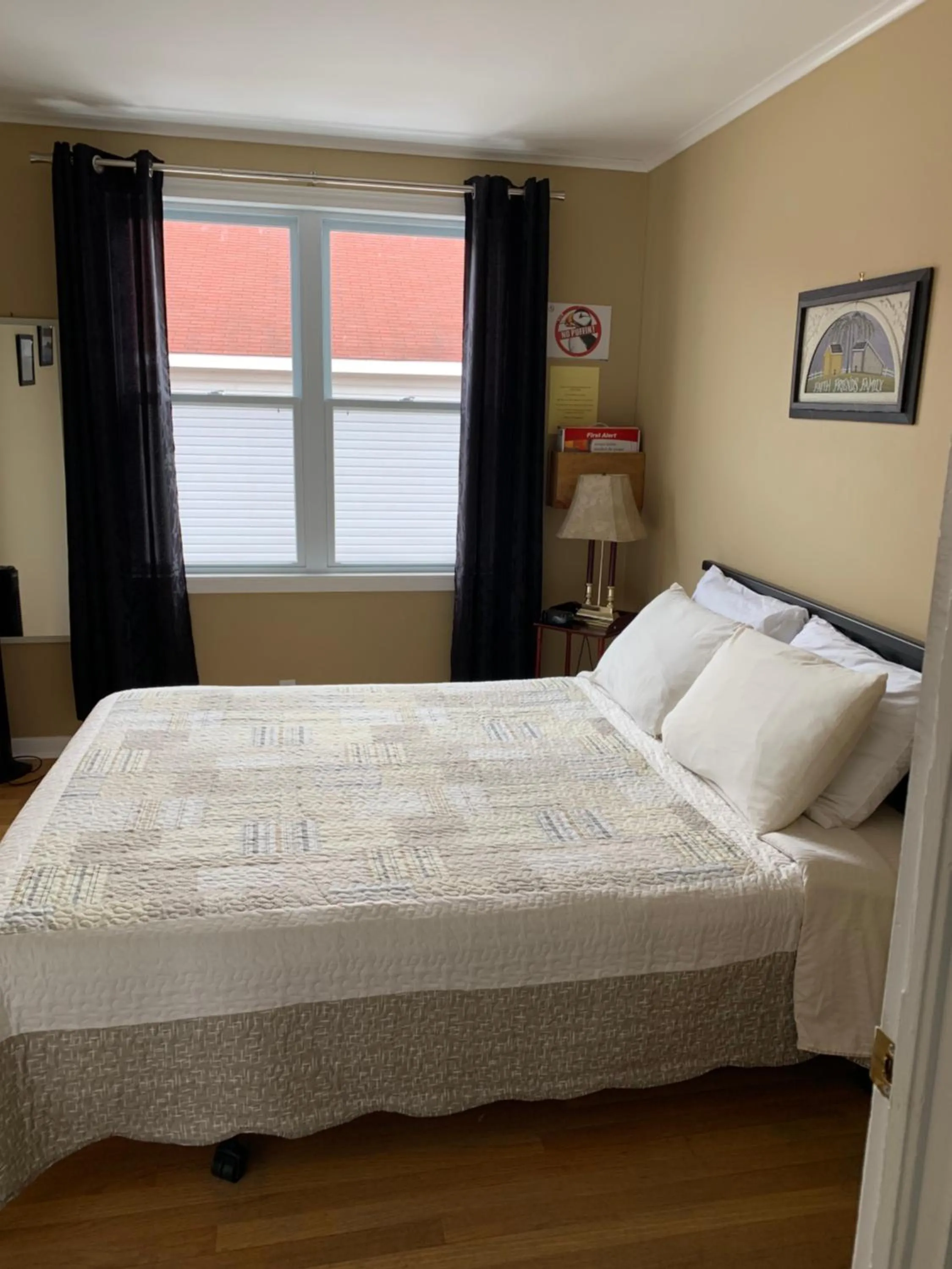 Bed in Exploits Inn and Suites