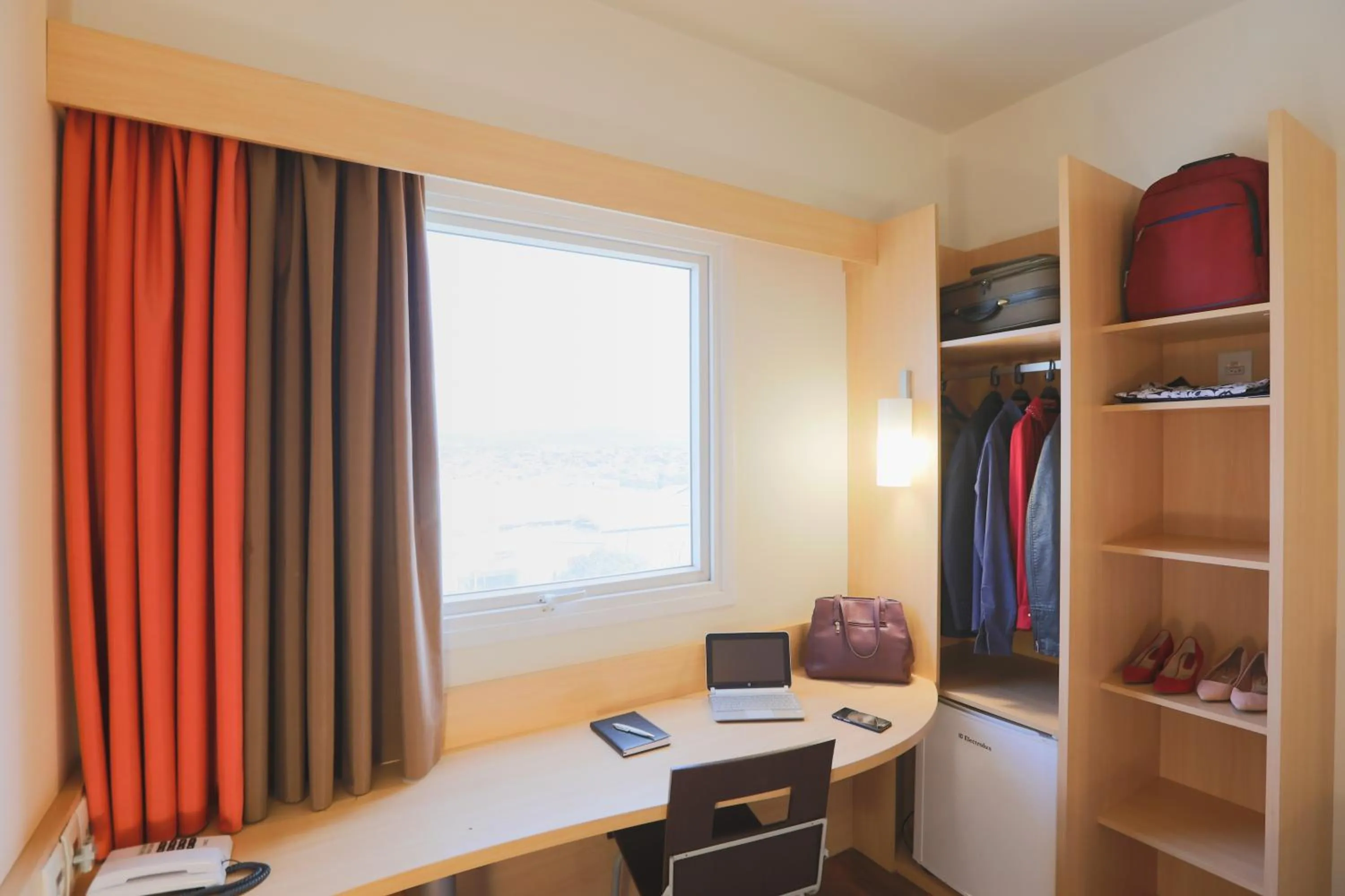 Bedroom in ibis Montes Claros Shopping