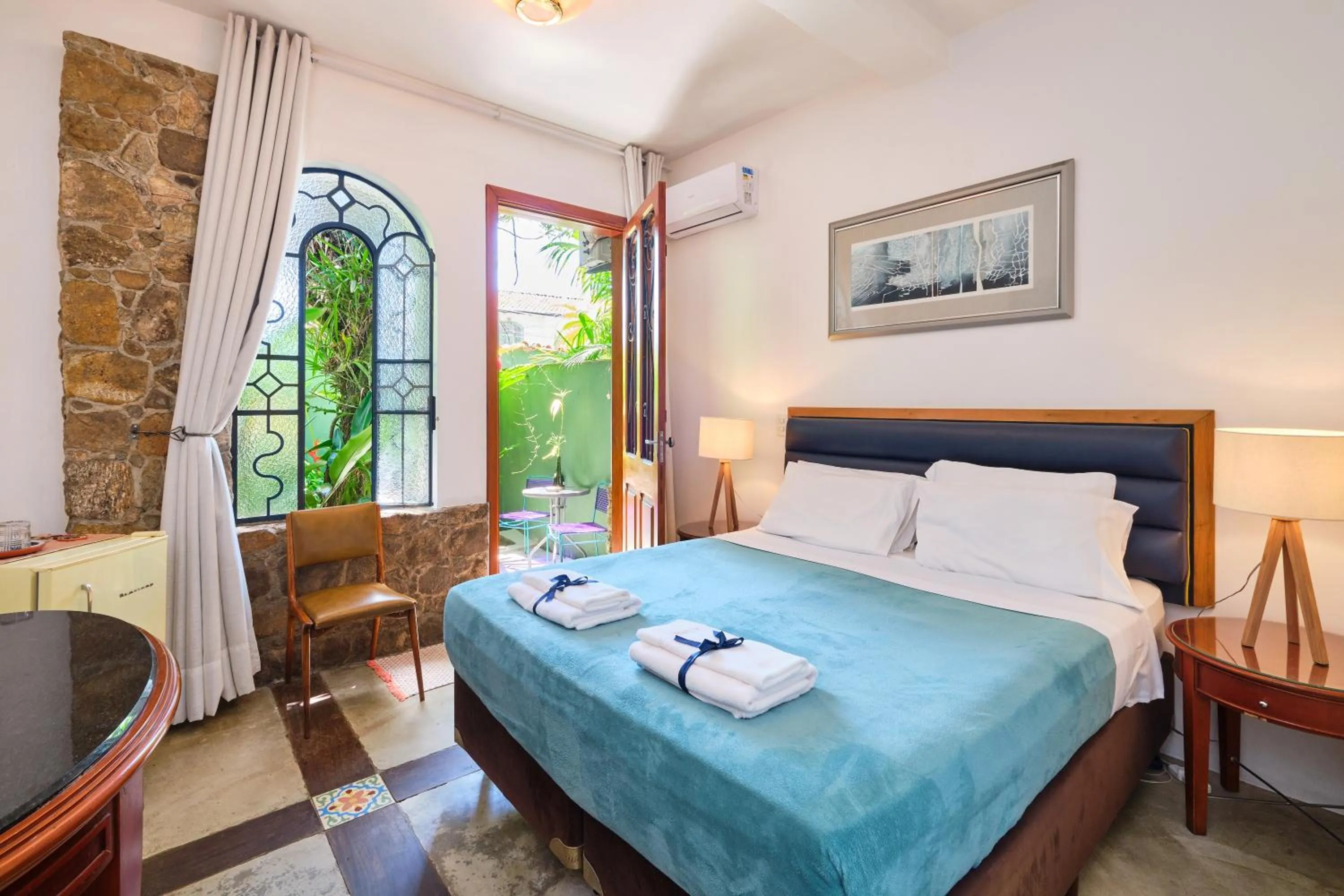 Bed in Pousada Pontal Gardens