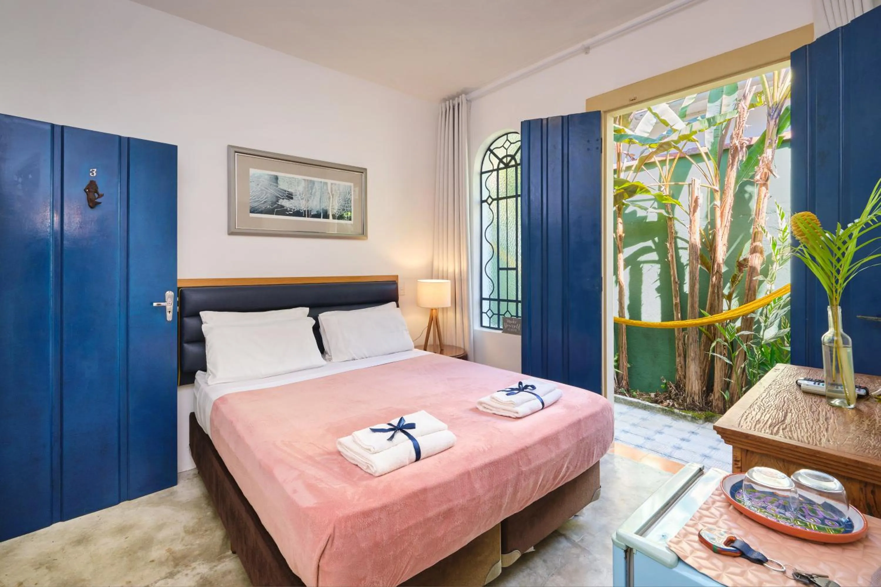 Bed in Pousada Pontal Gardens