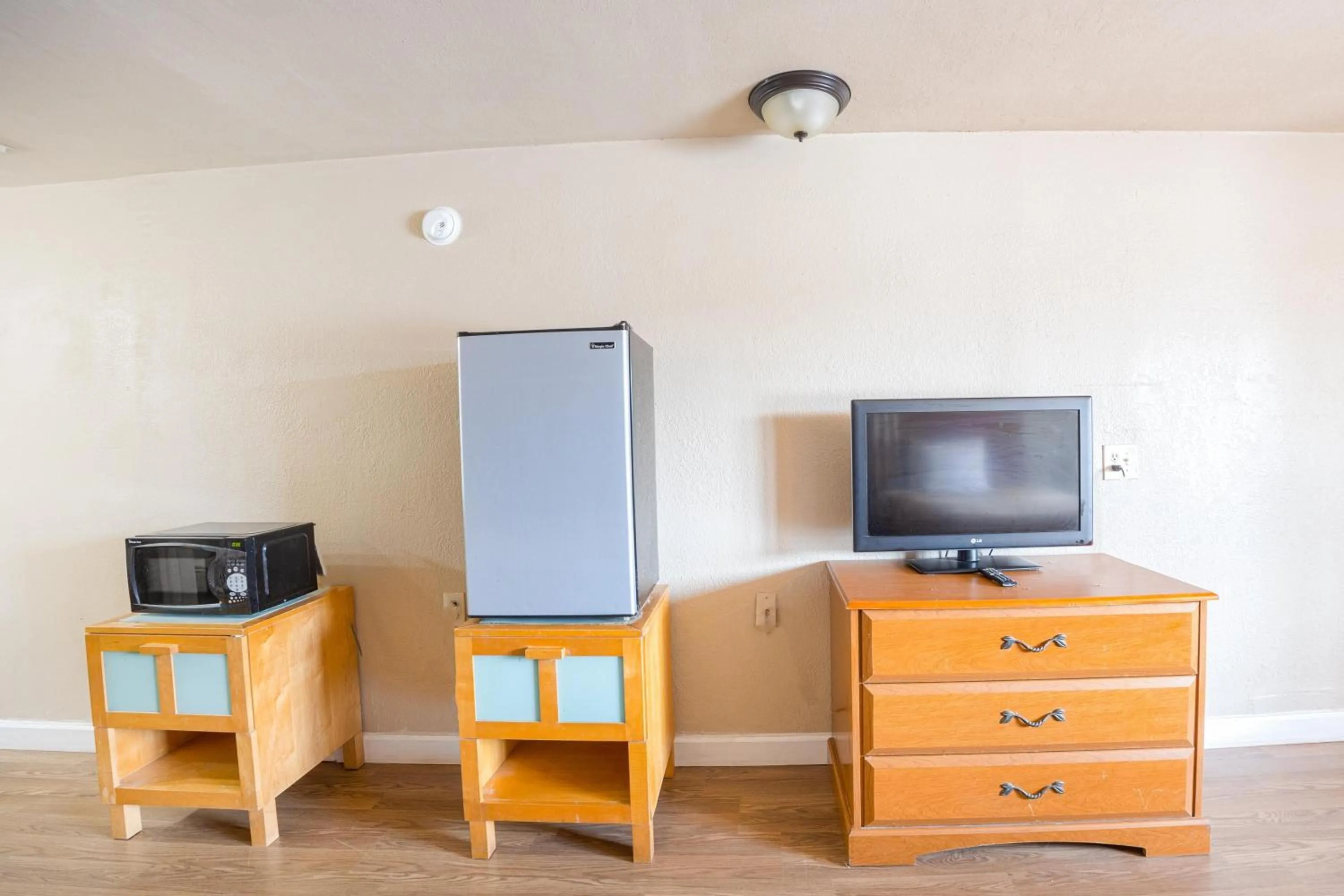 Bedroom in Liberty Garden Inn by OYO Kissimmee near Disney World