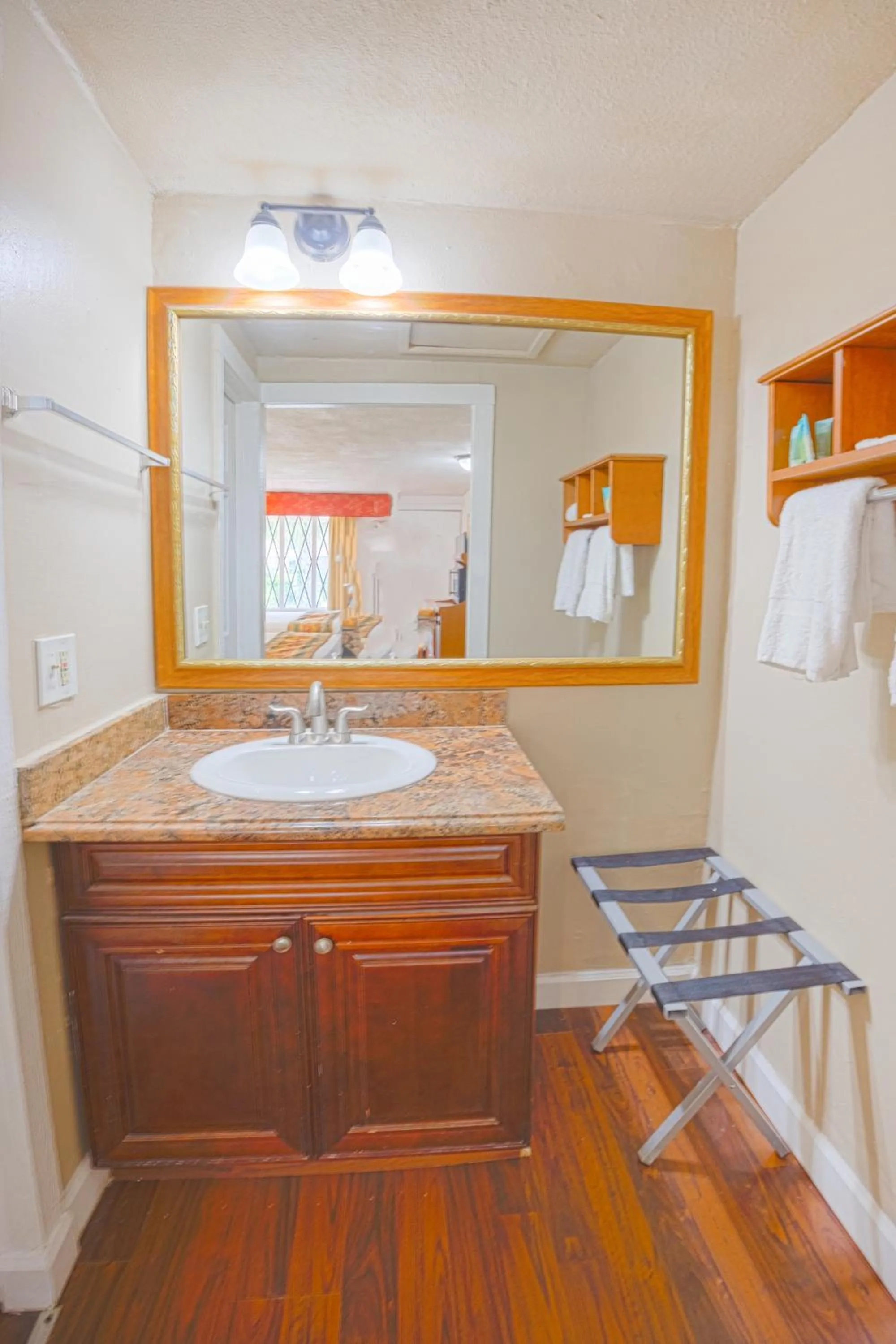 Bathroom in Liberty Garden Inn by OYO Kissimmee near Disney World