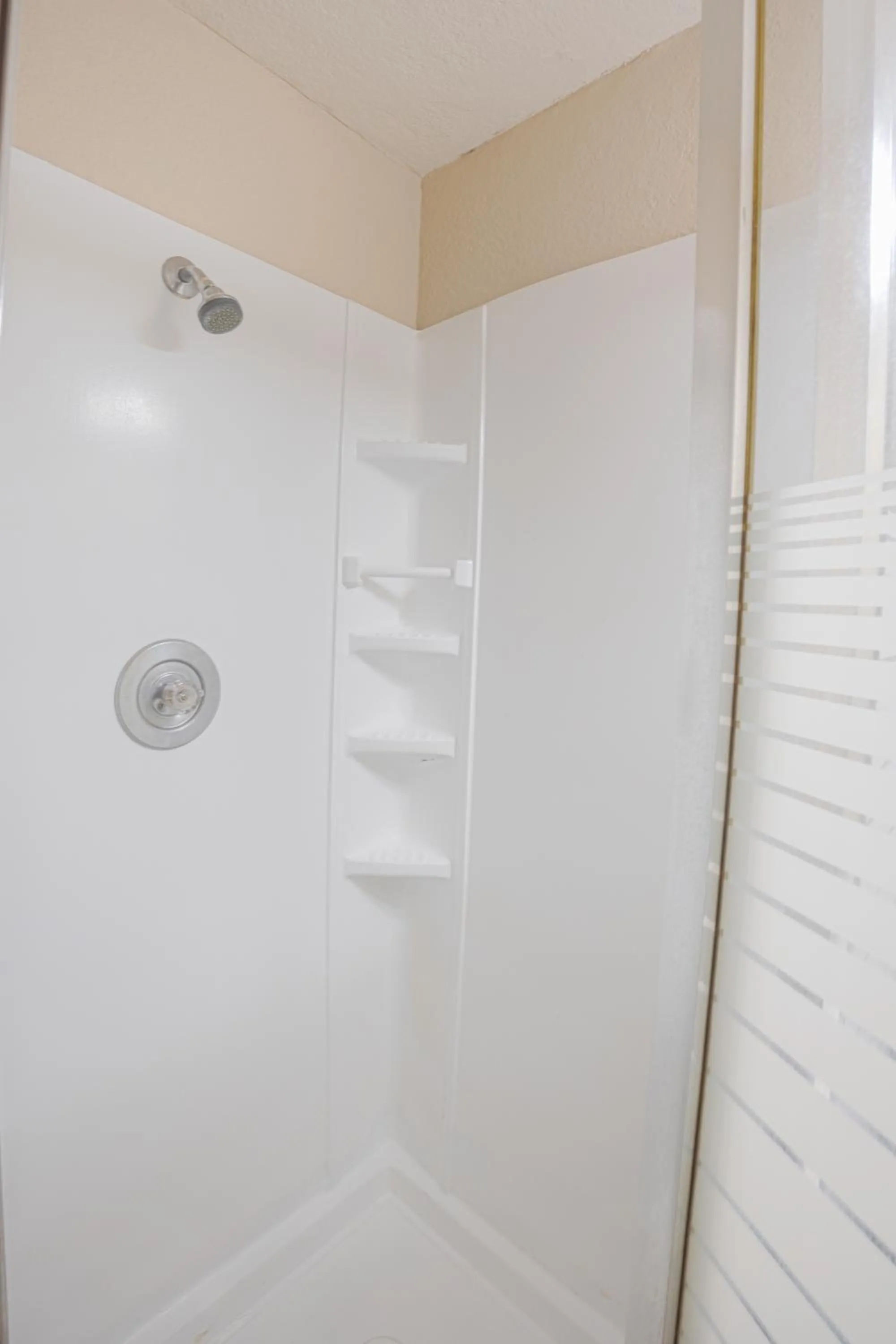 Bathroom in Liberty Garden Inn by OYO Kissimmee near Disney World