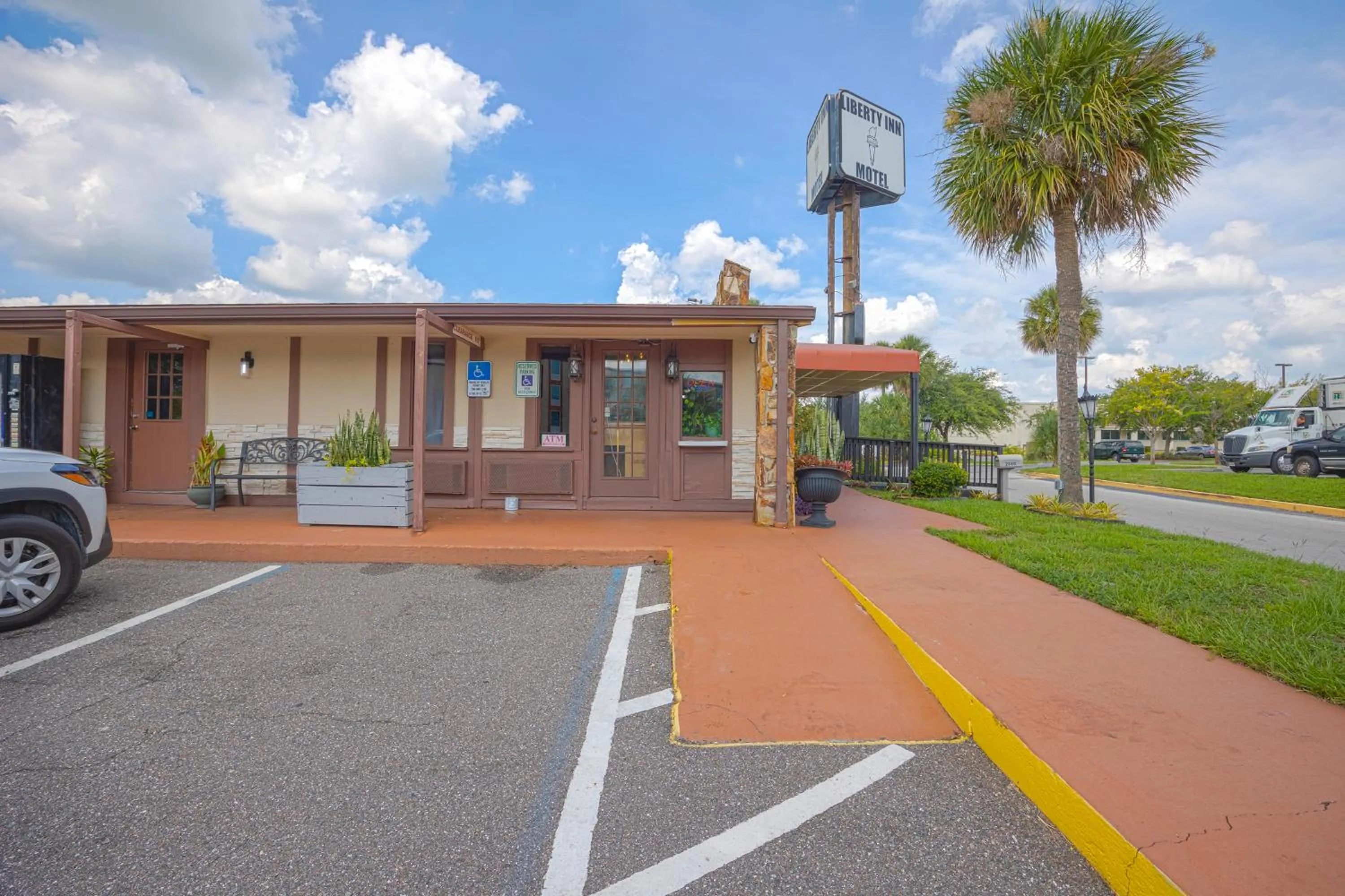 Property building in Liberty Garden Inn by OYO Kissimmee near Disney World