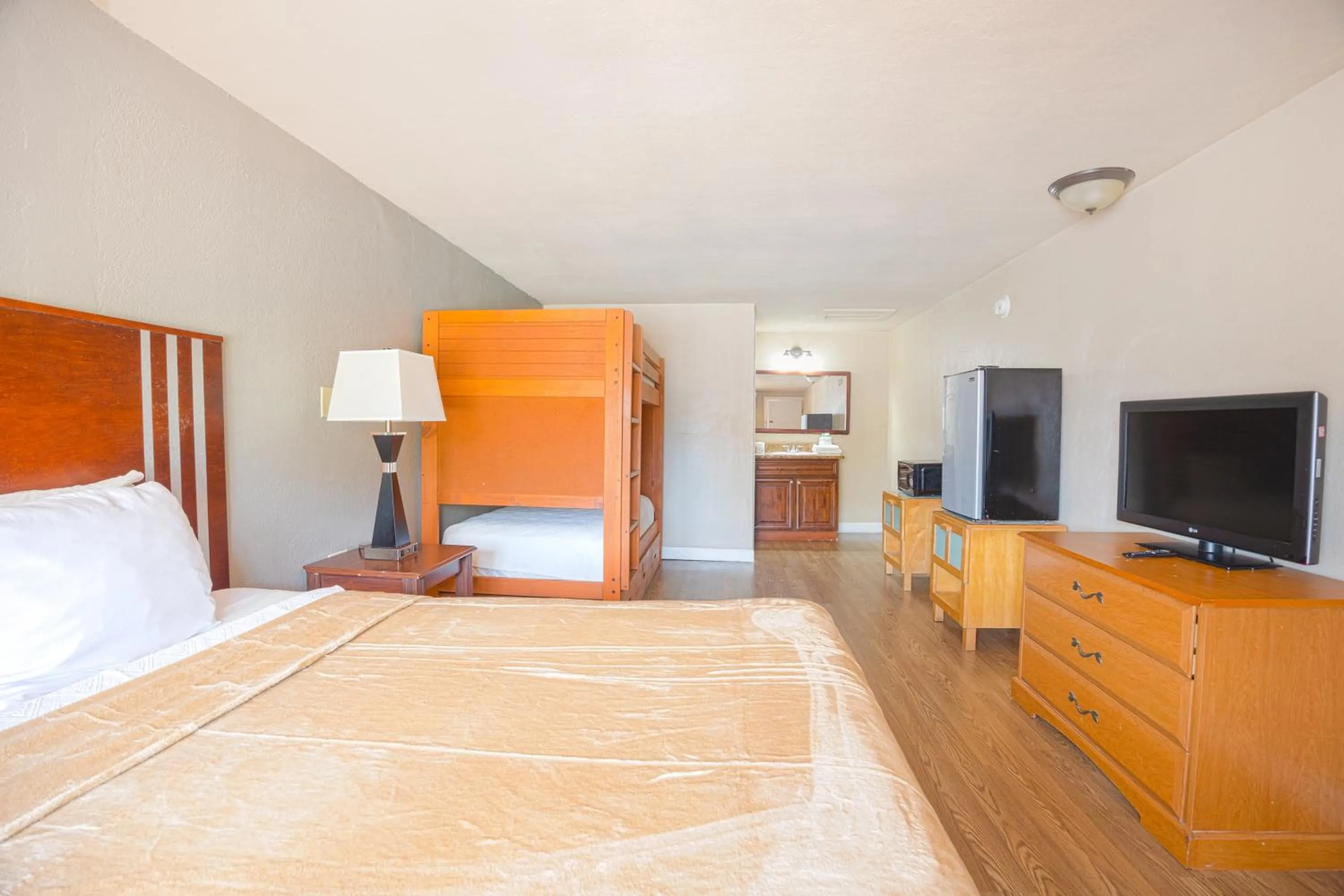 Bedroom, Bed in Liberty Garden Inn by OYO Kissimmee near Disney World