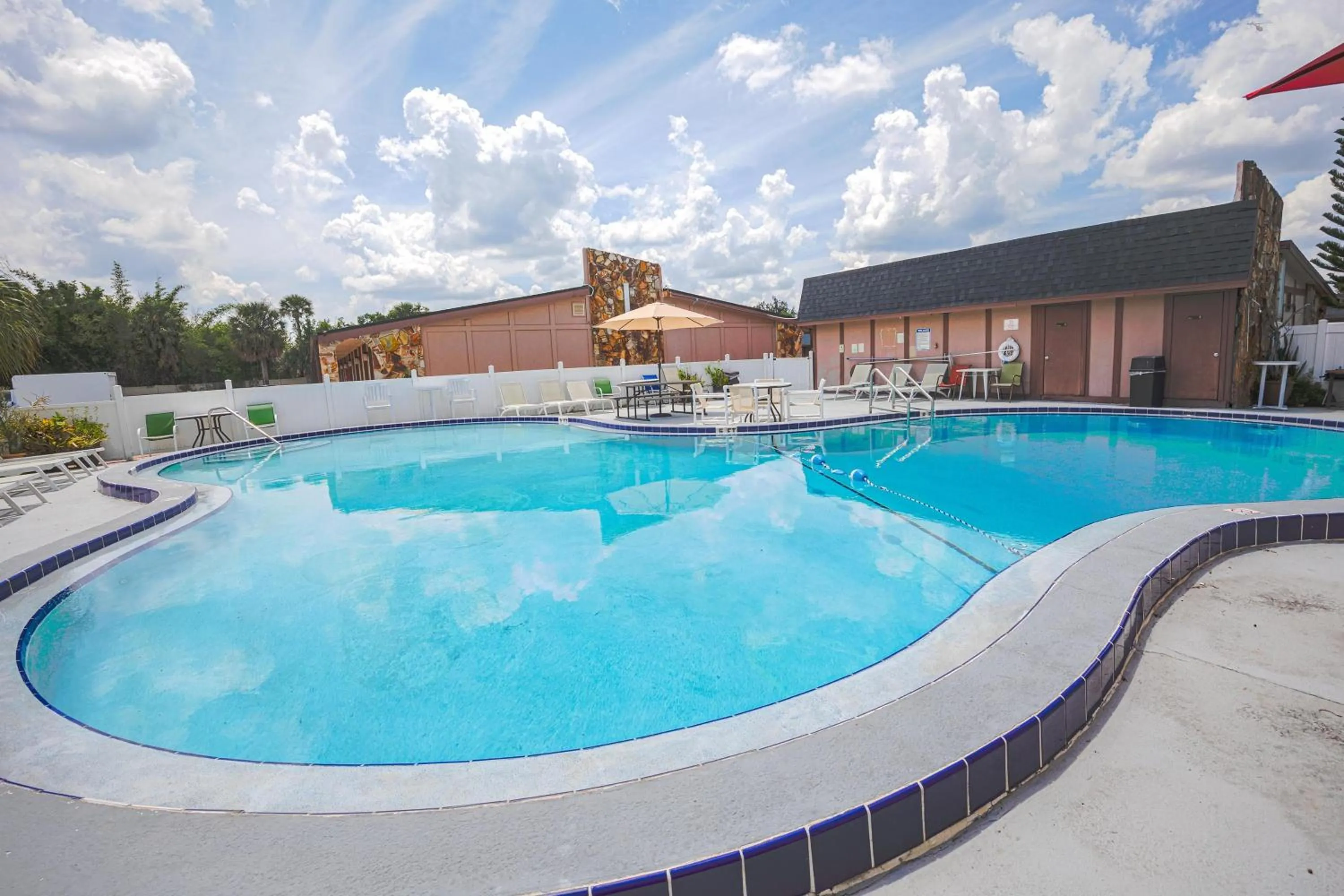 Swimming pool in Liberty Garden Inn by OYO Kissimmee near Disney World