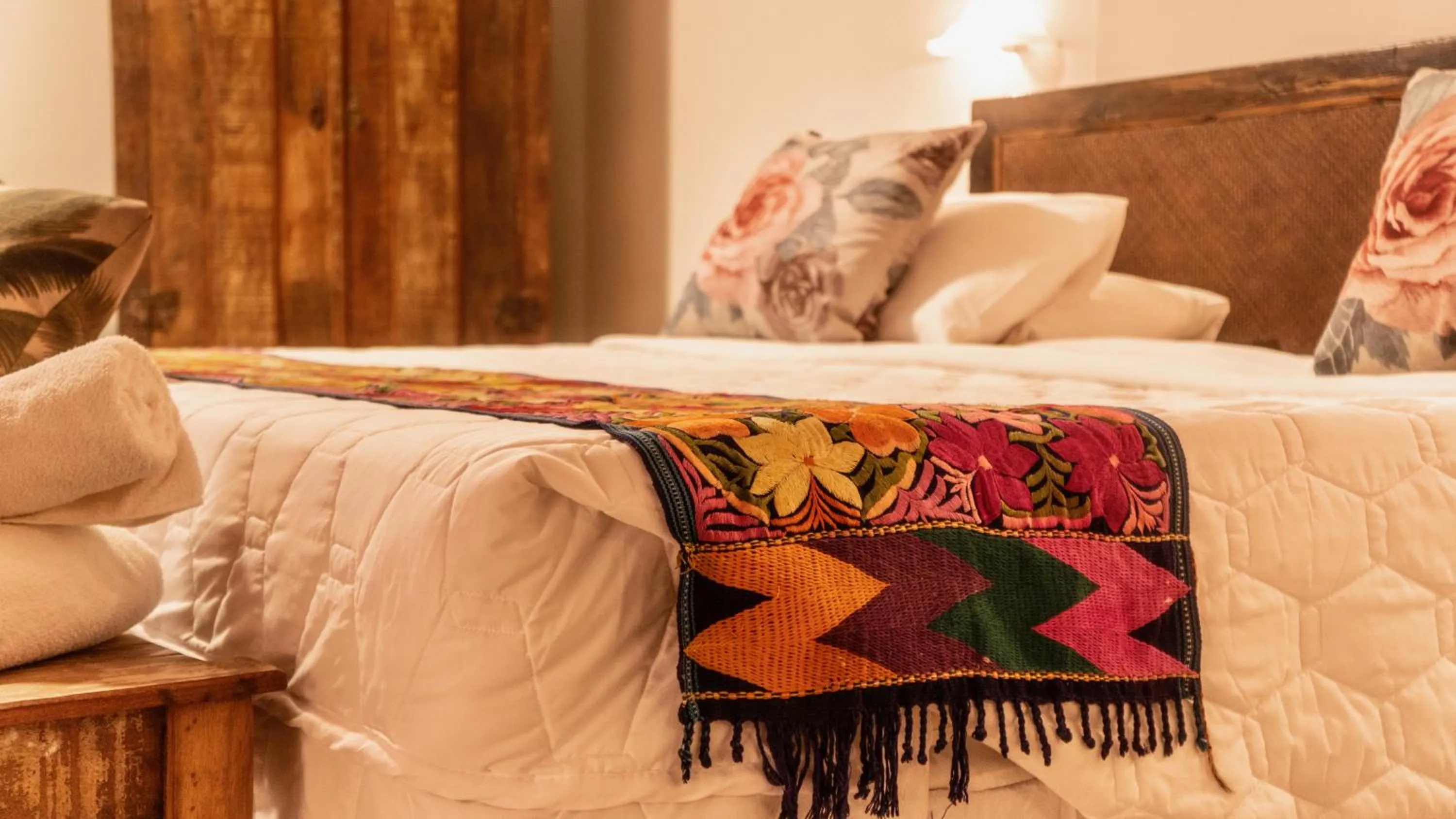 Bed in Le Village Boutique Hotel