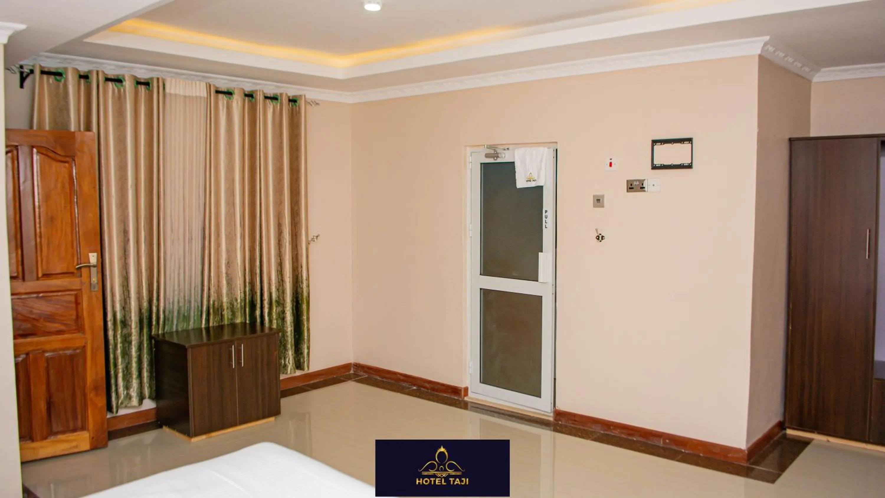 Bedroom in HOTEL TAJI