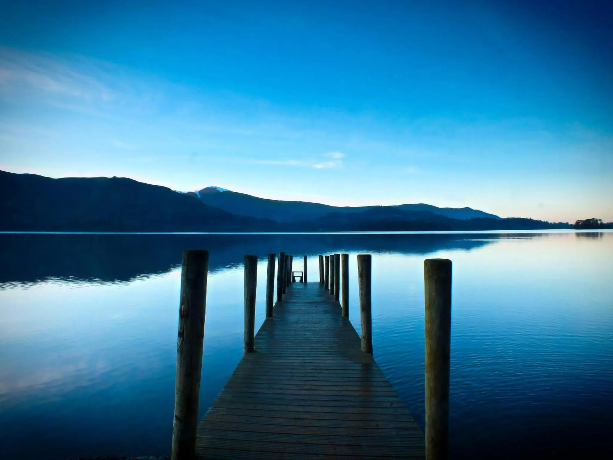 Natural landscape in Blelham Tarn Rustic cabin in tranquil woodland