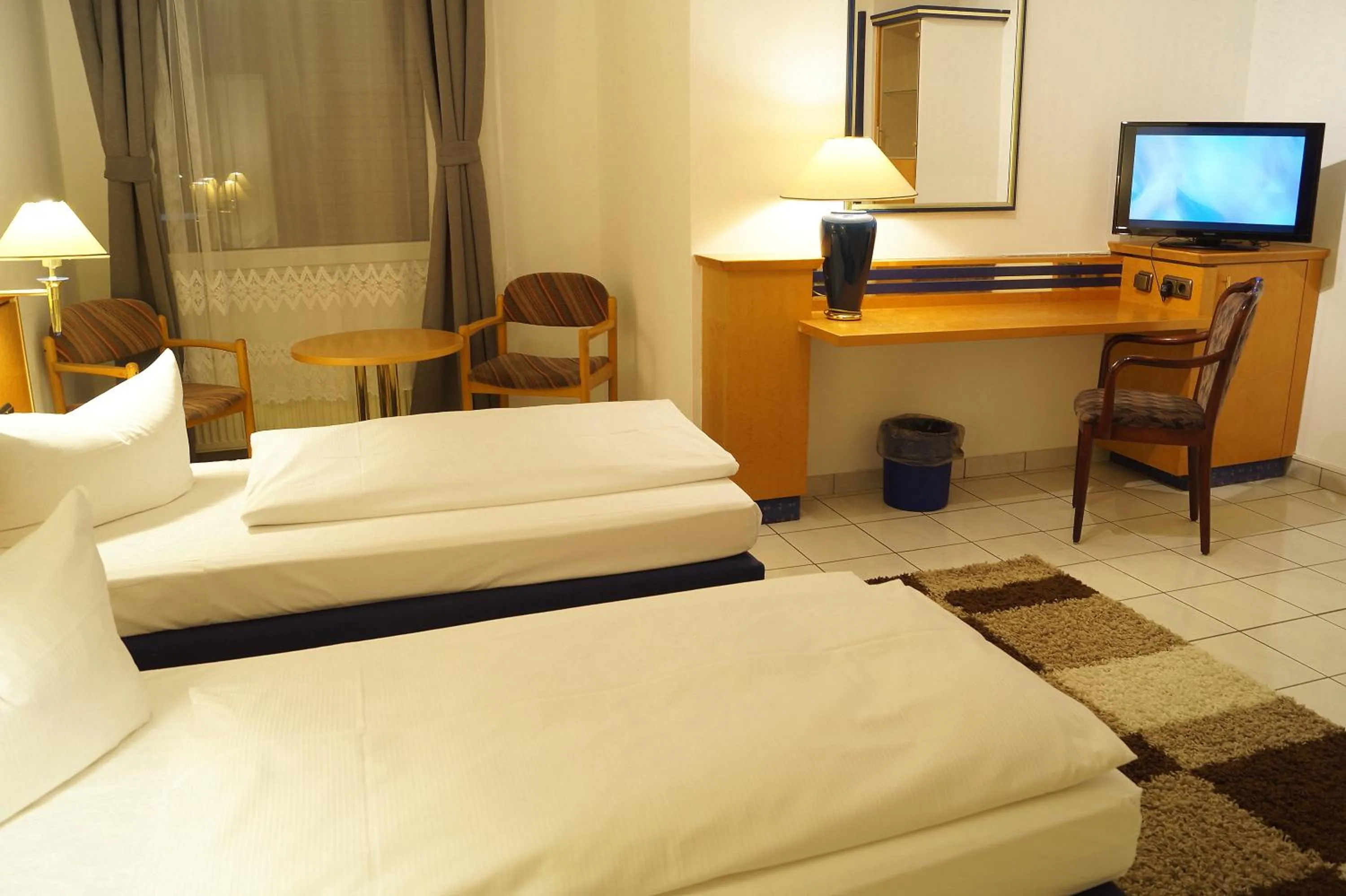 Photo of the whole room, Bed in Hotel Rahlstedter Hof