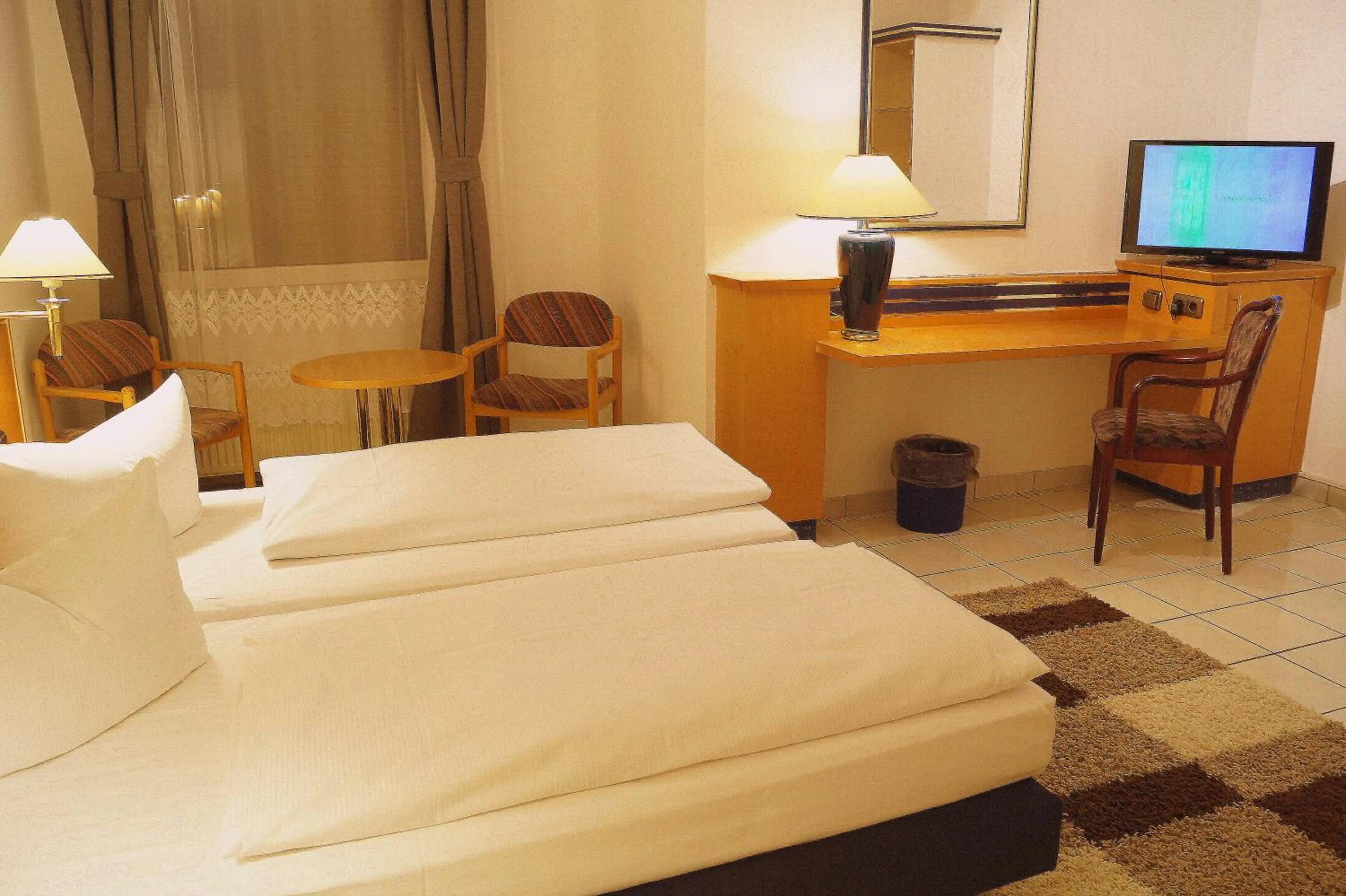 Photo of the whole room, Bed in Hotel Rahlstedter Hof