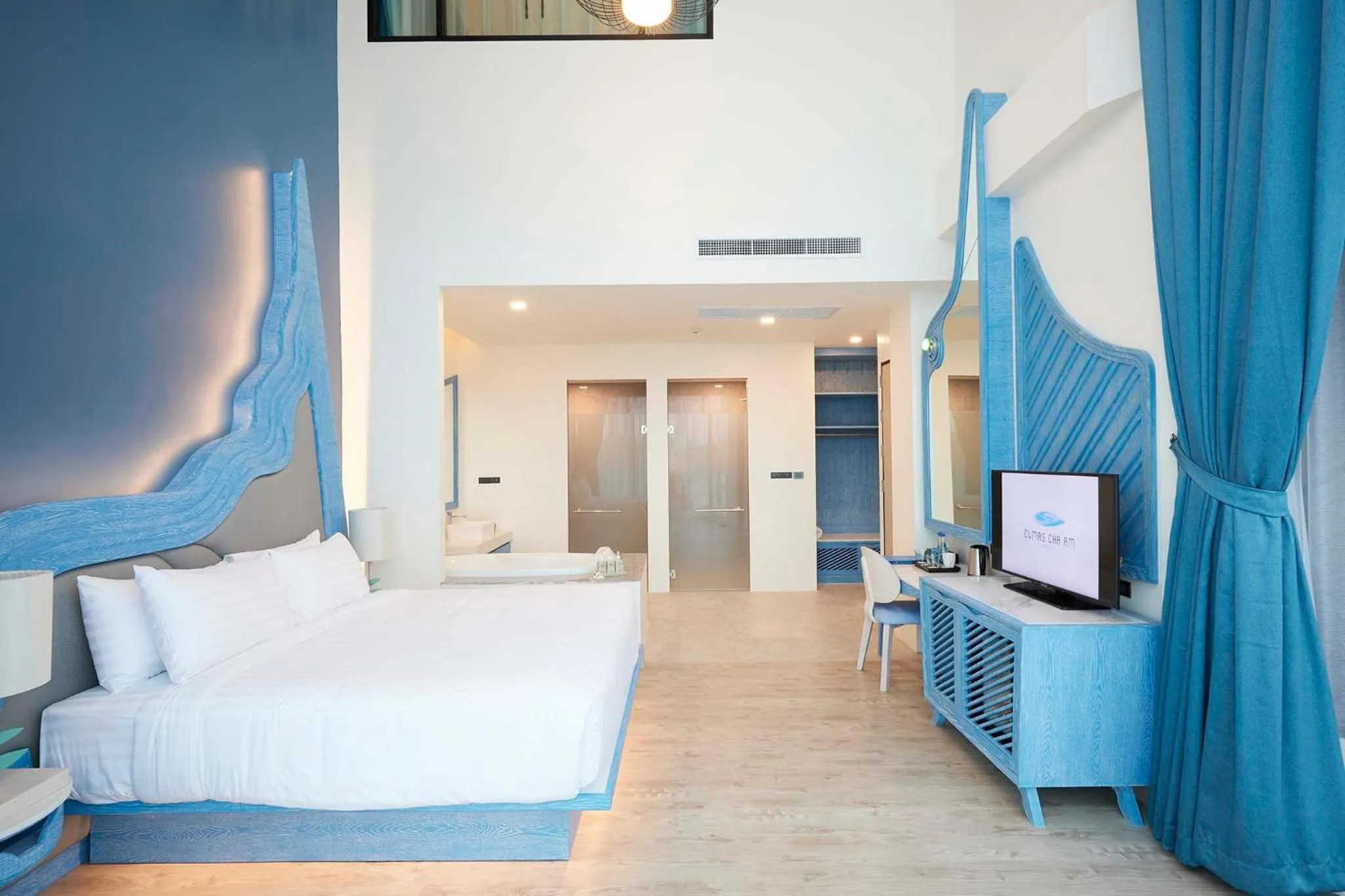 Communal lounge/ TV room, Bed in Elmas Cha Am Design Hotel