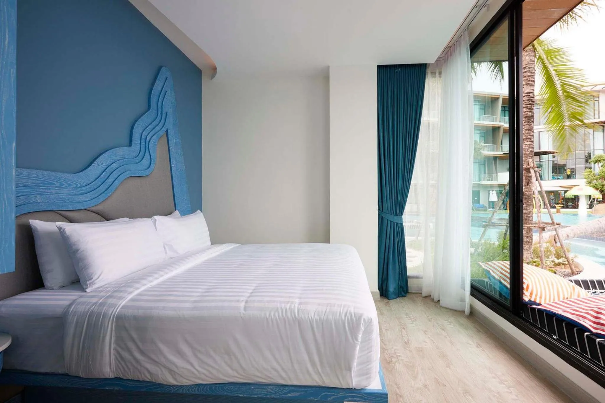 Bed in Elmas Cha Am Design Hotel