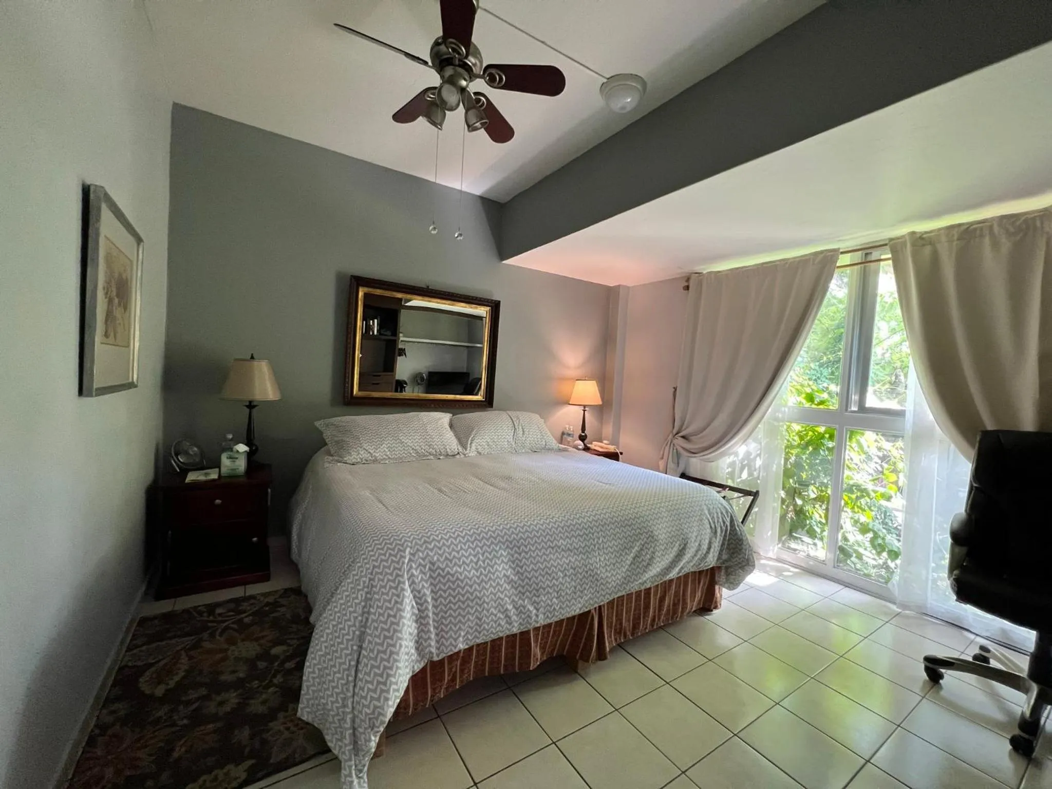 Bed in Dickinson Guest House, Guadalajara Expo