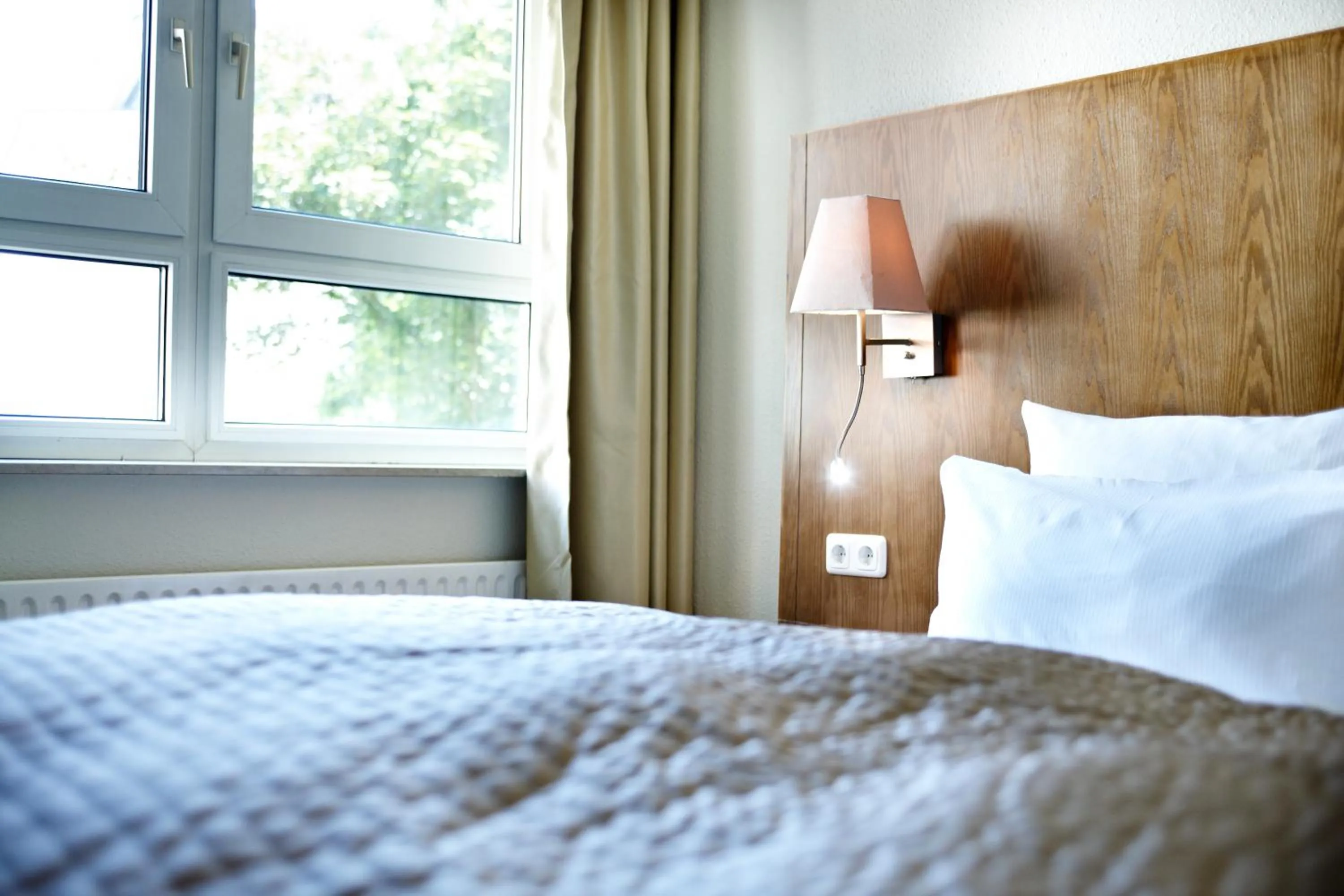 Bed in Hotel Domicil Hamburg by Golden Tulip