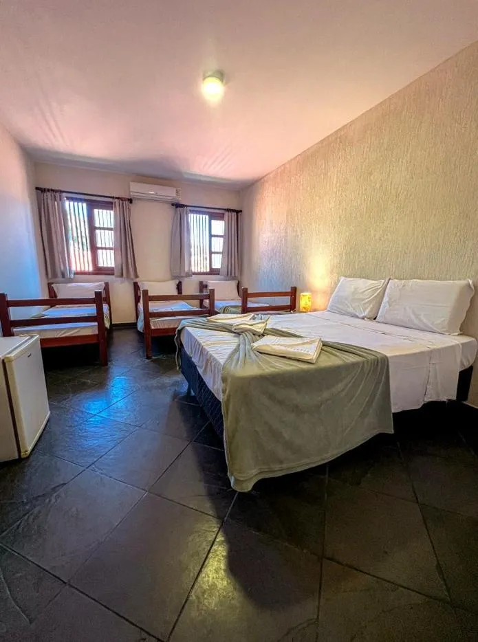 Bed in Pousada Céu de Estrelas