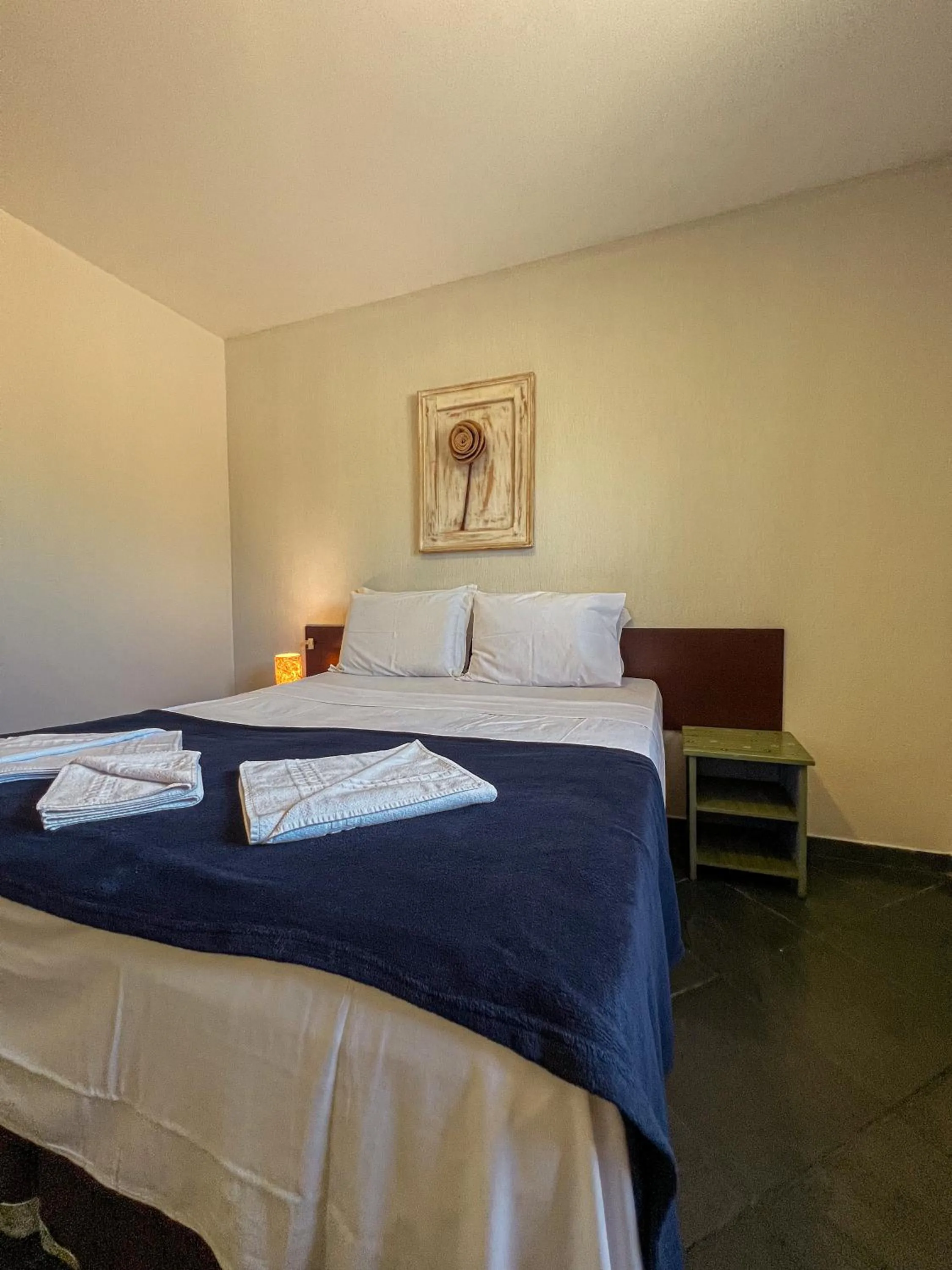 Bed in Pousada Céu de Estrelas