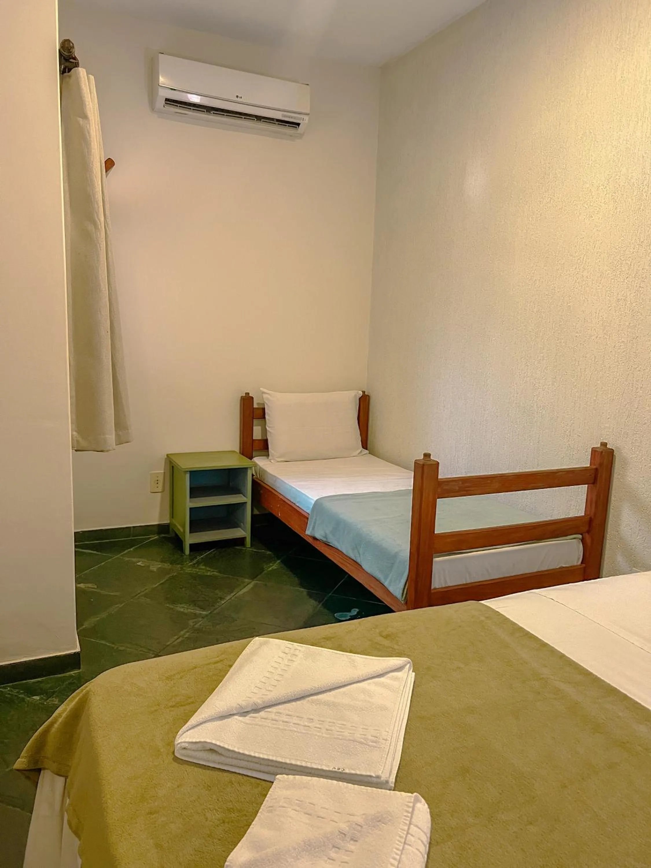 Bed in Pousada Céu de Estrelas