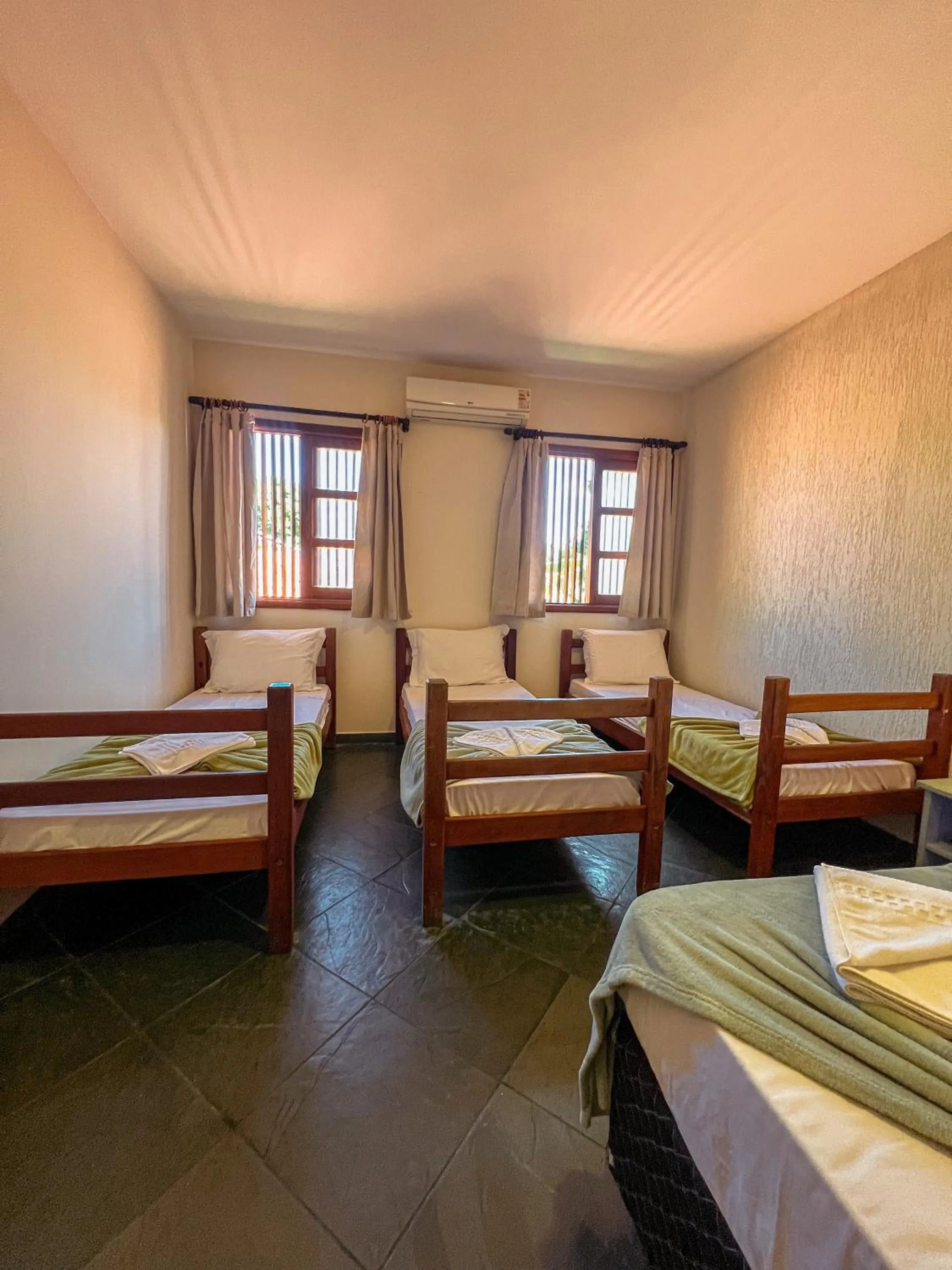 Bed in Pousada Céu de Estrelas