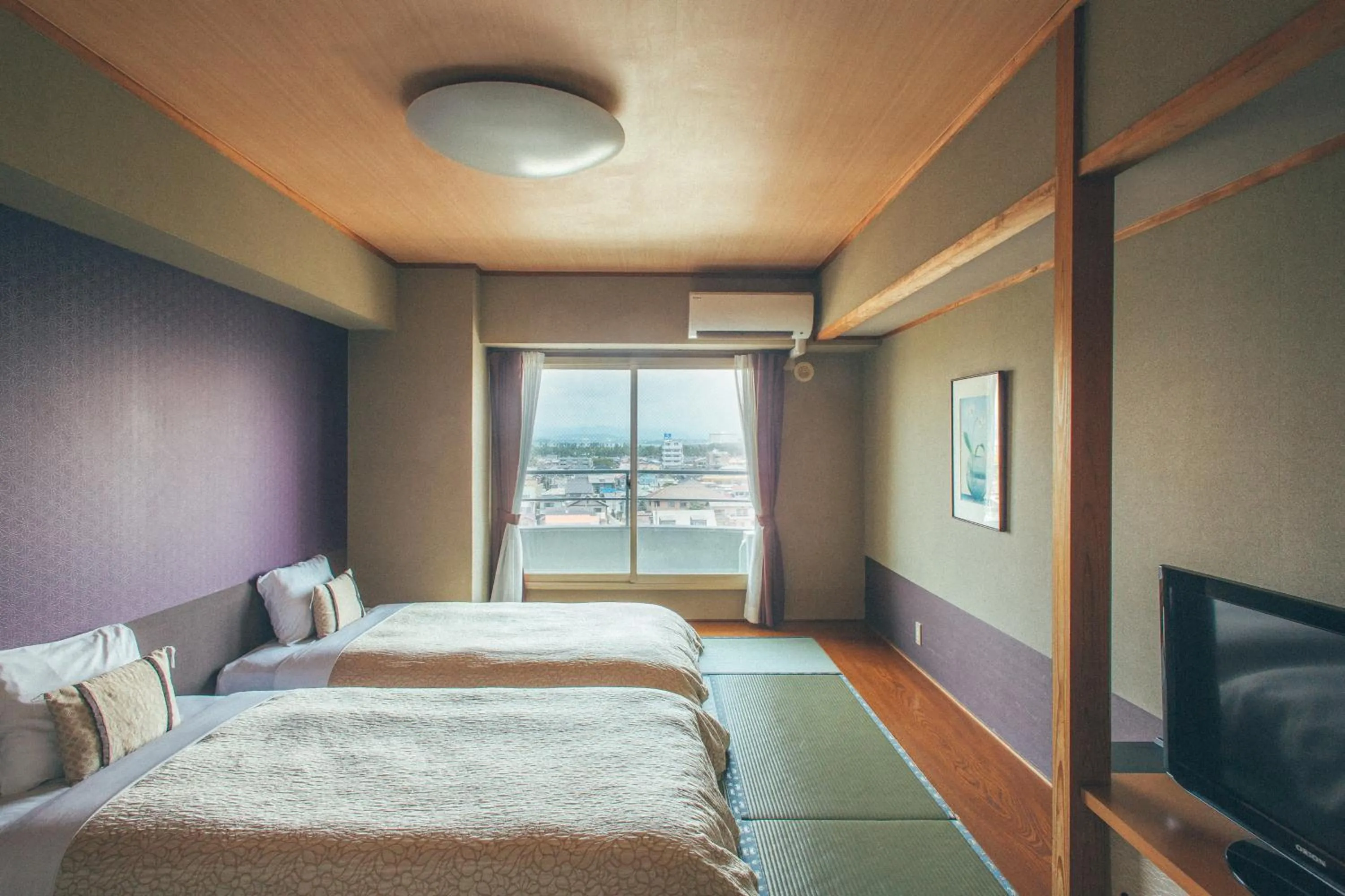 Bed in Hamanako Bentenjima Resort The Ocean