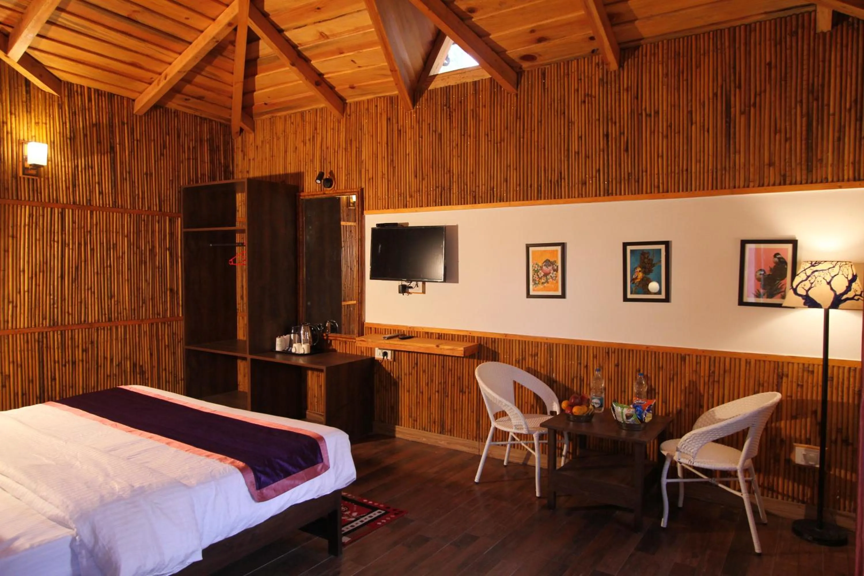 Communal lounge/ TV room, Bed in The Nature's Green Resort, Bhimtal, Nainital