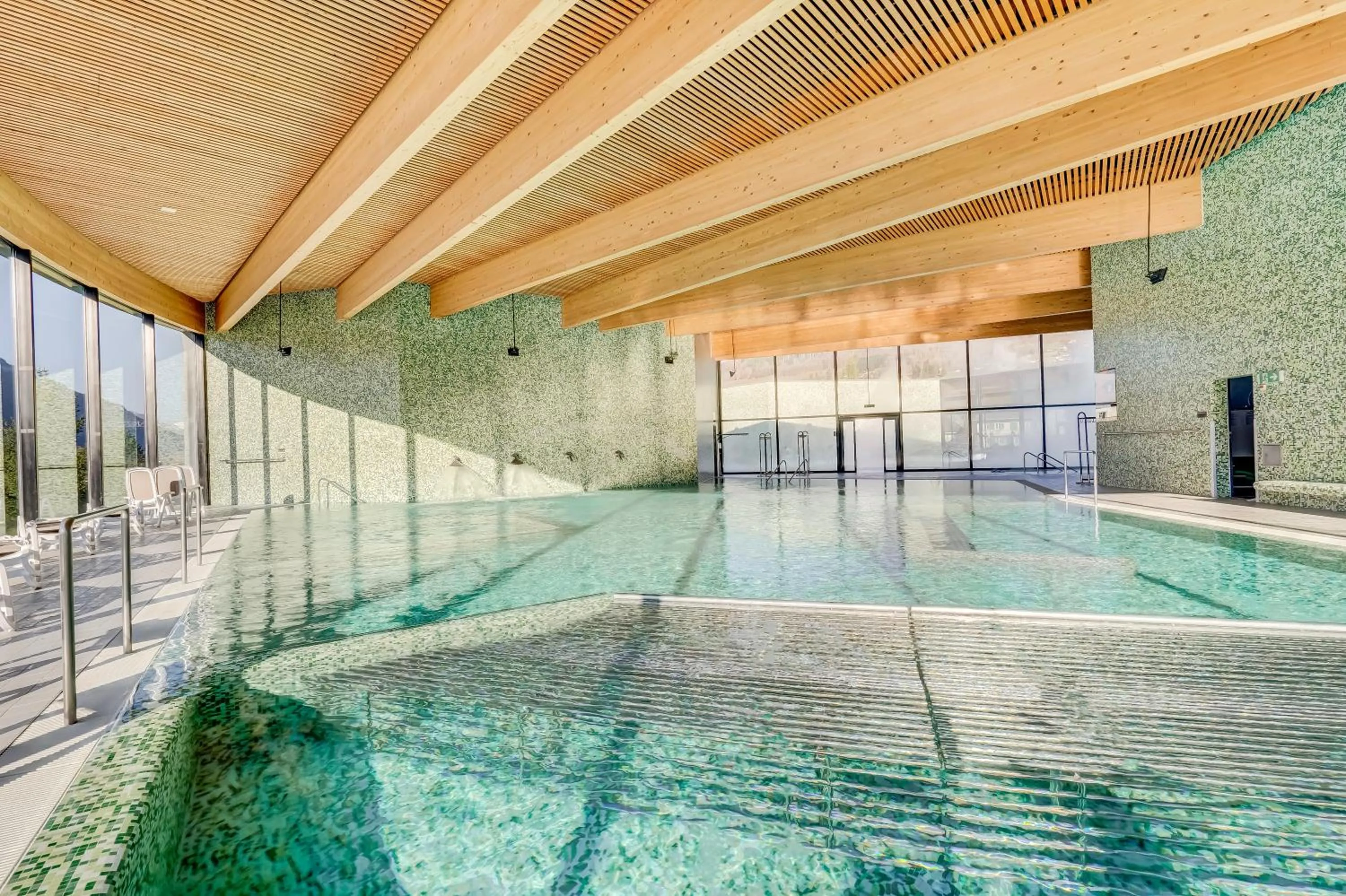 Swimming pool in Hôtel Cailler & Bains de la Gruyère