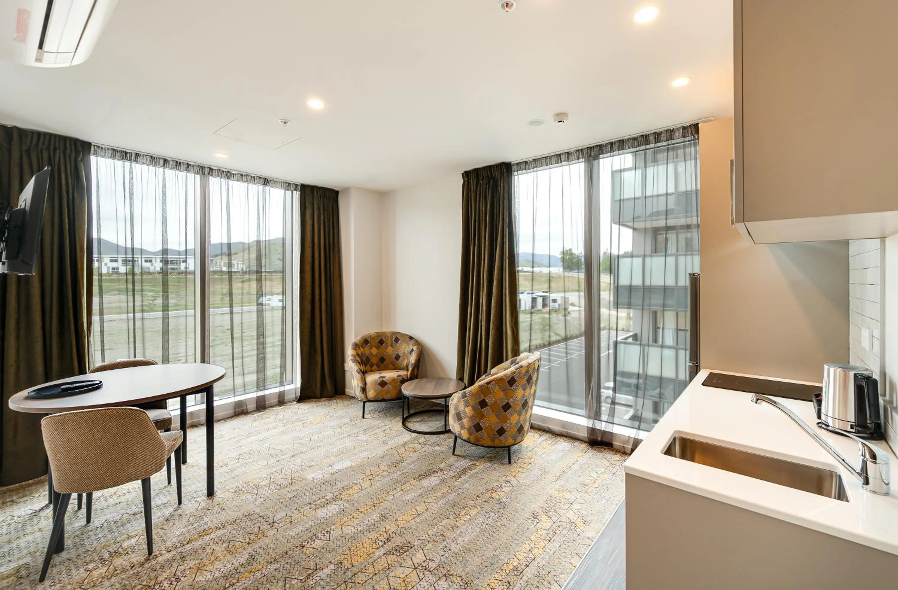 Living room in La Quinta by Wyndham Remarkables Park Queenstown