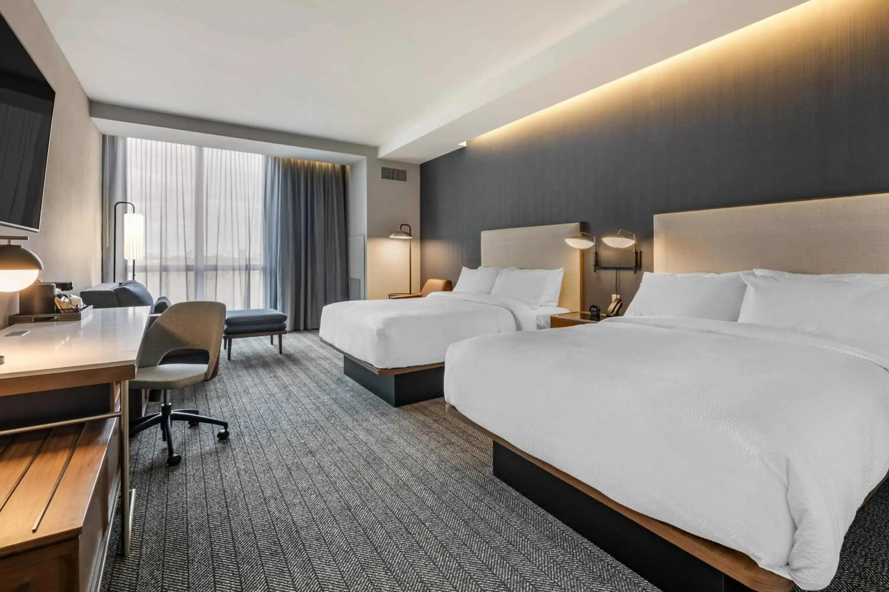 Guest room with two queen beds, sofa bed and city view in Courtyard by Marriott Fort Lauderdale Downtown Guest room with two queen beds, sofa bed and city view in Courtyard by Marriott Fort Lauderdale Downtown