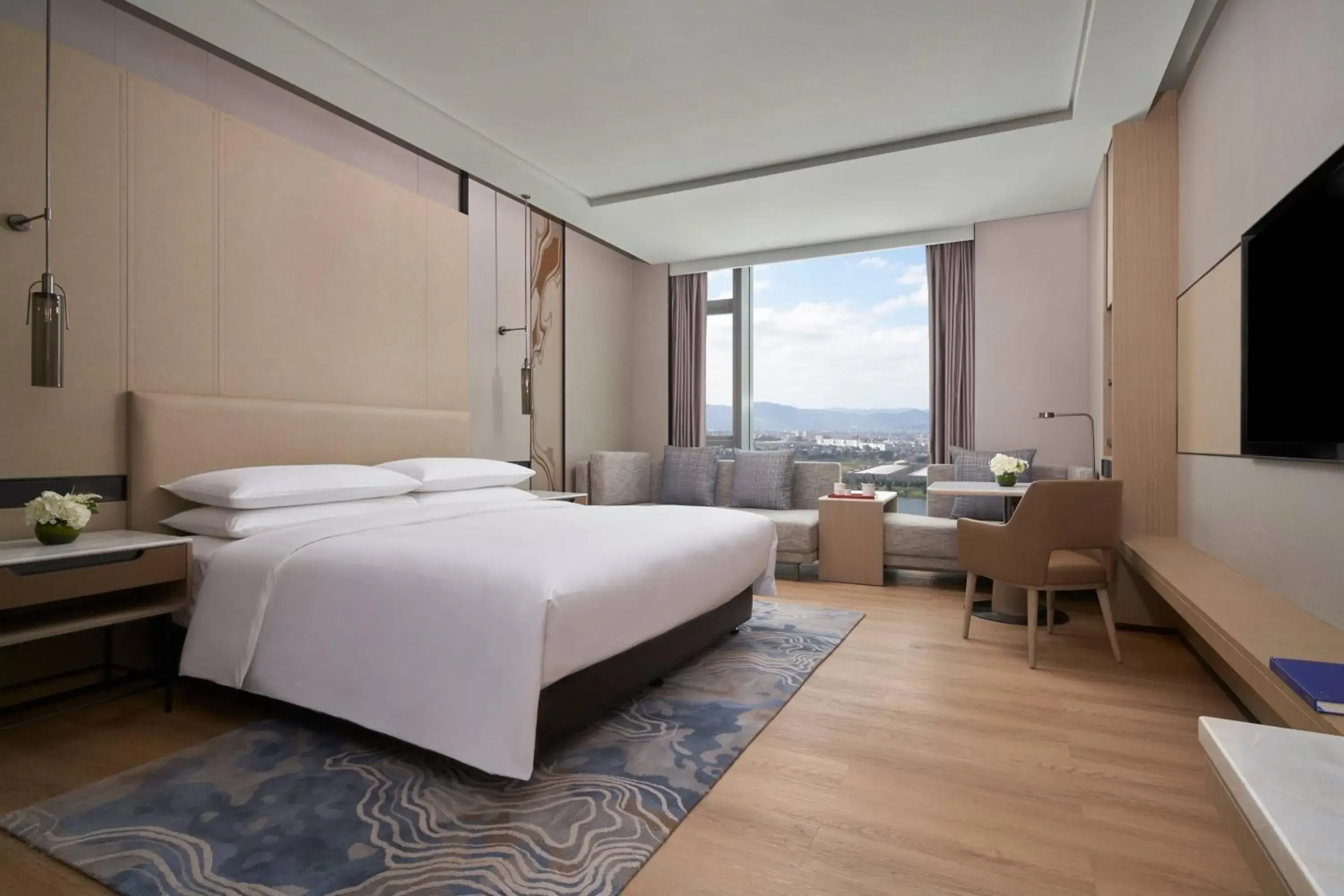 Superior guest room with king bed, sofa bed and bay view in Fuzhou Marriott Hotel Riverside Superior guest room with king bed, sofa bed and bay view in Fuzhou Marriott Hotel Riverside