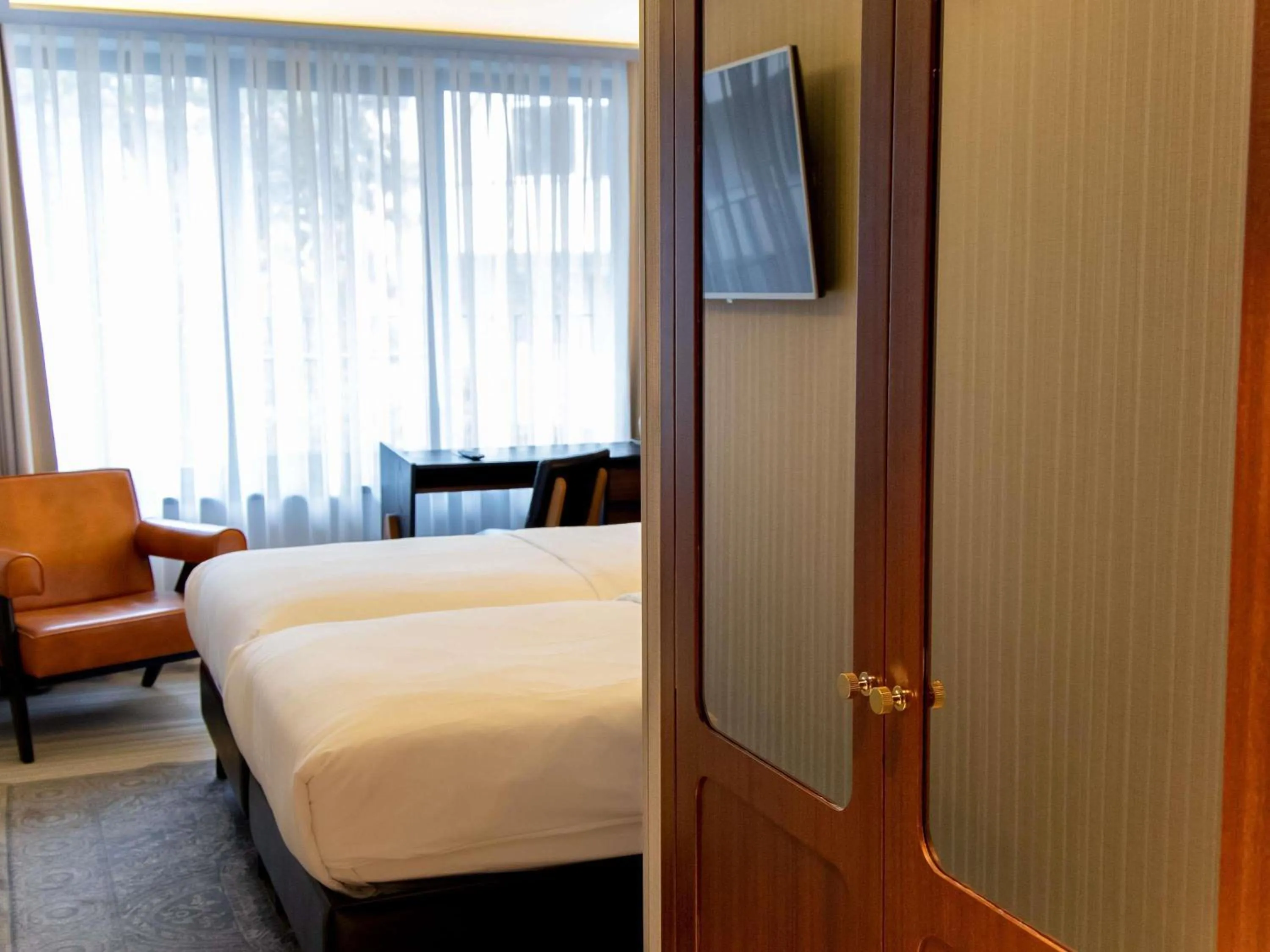 Bedroom, Bed in MUZE Hotel Dusseldorf - Handwritten Collection