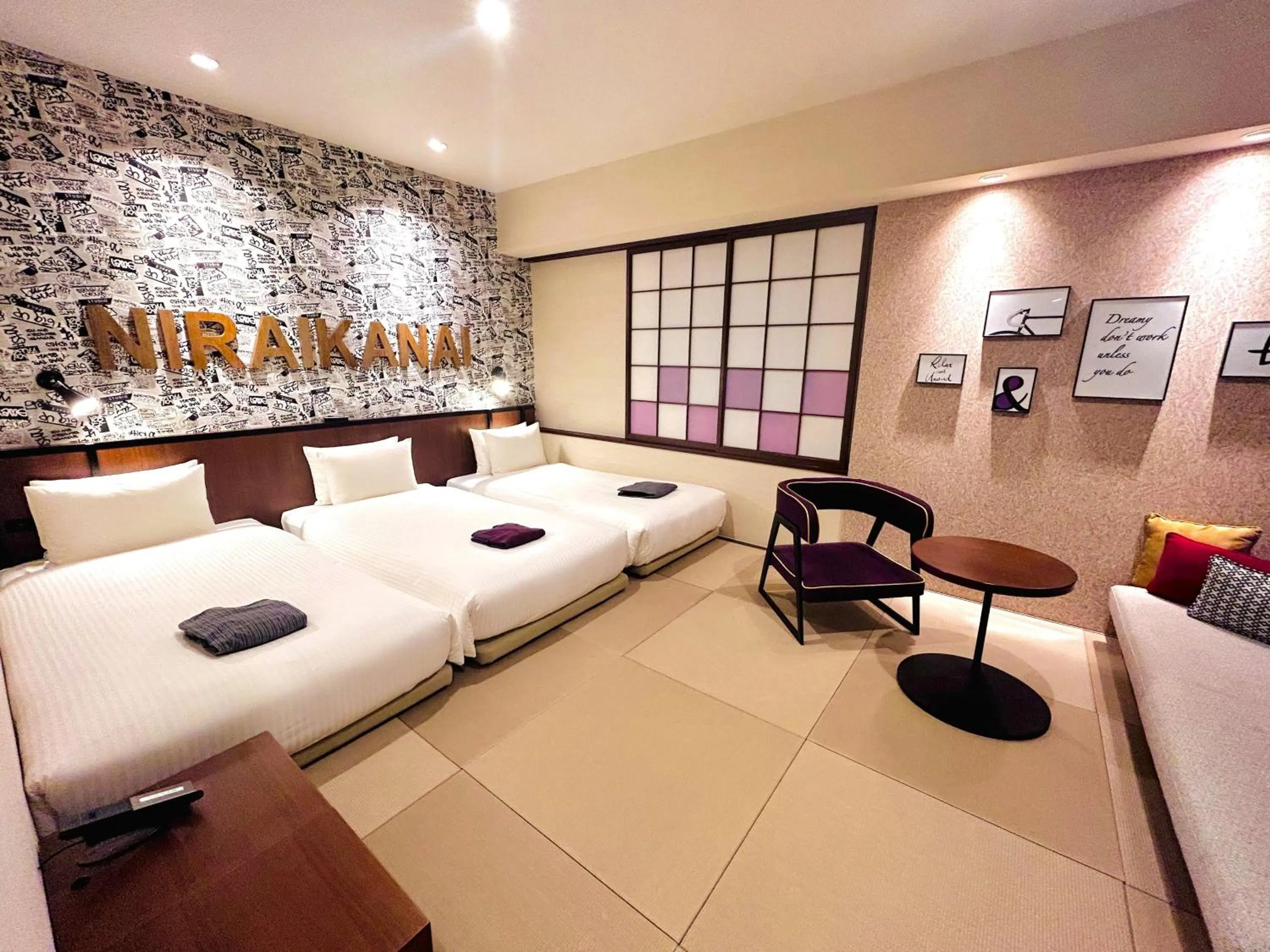 Bed in PROSTYLE RYOKAN Naha Kenchou Mae