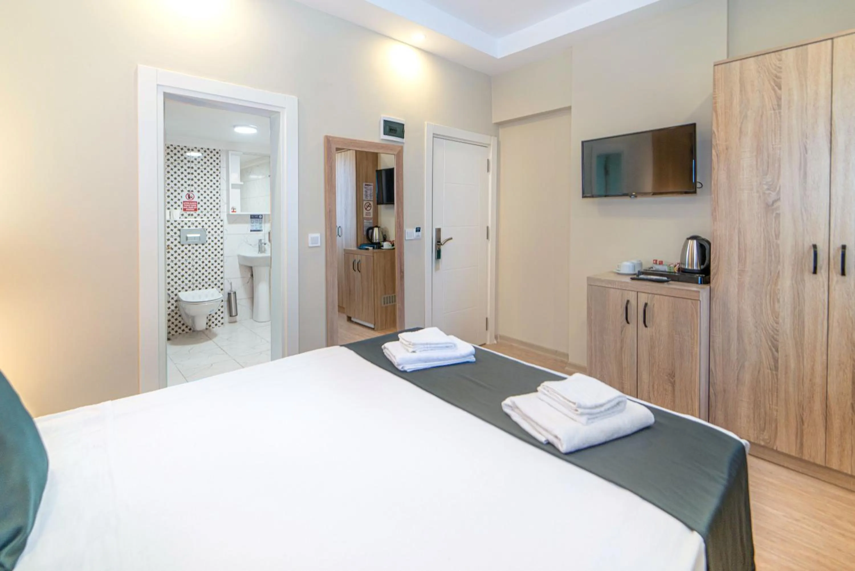 Bed in Deniz Boutique Hotel