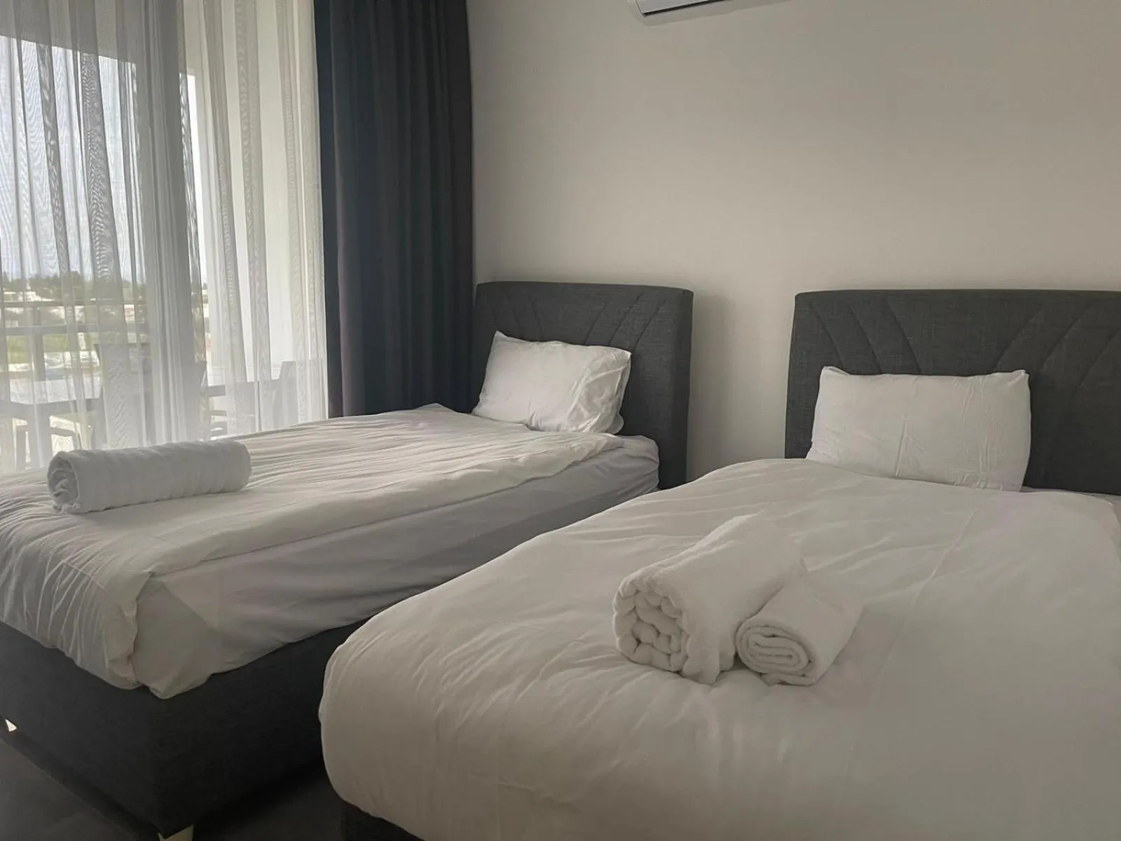 Bed in Courtyard Long Beach Holiday Resort