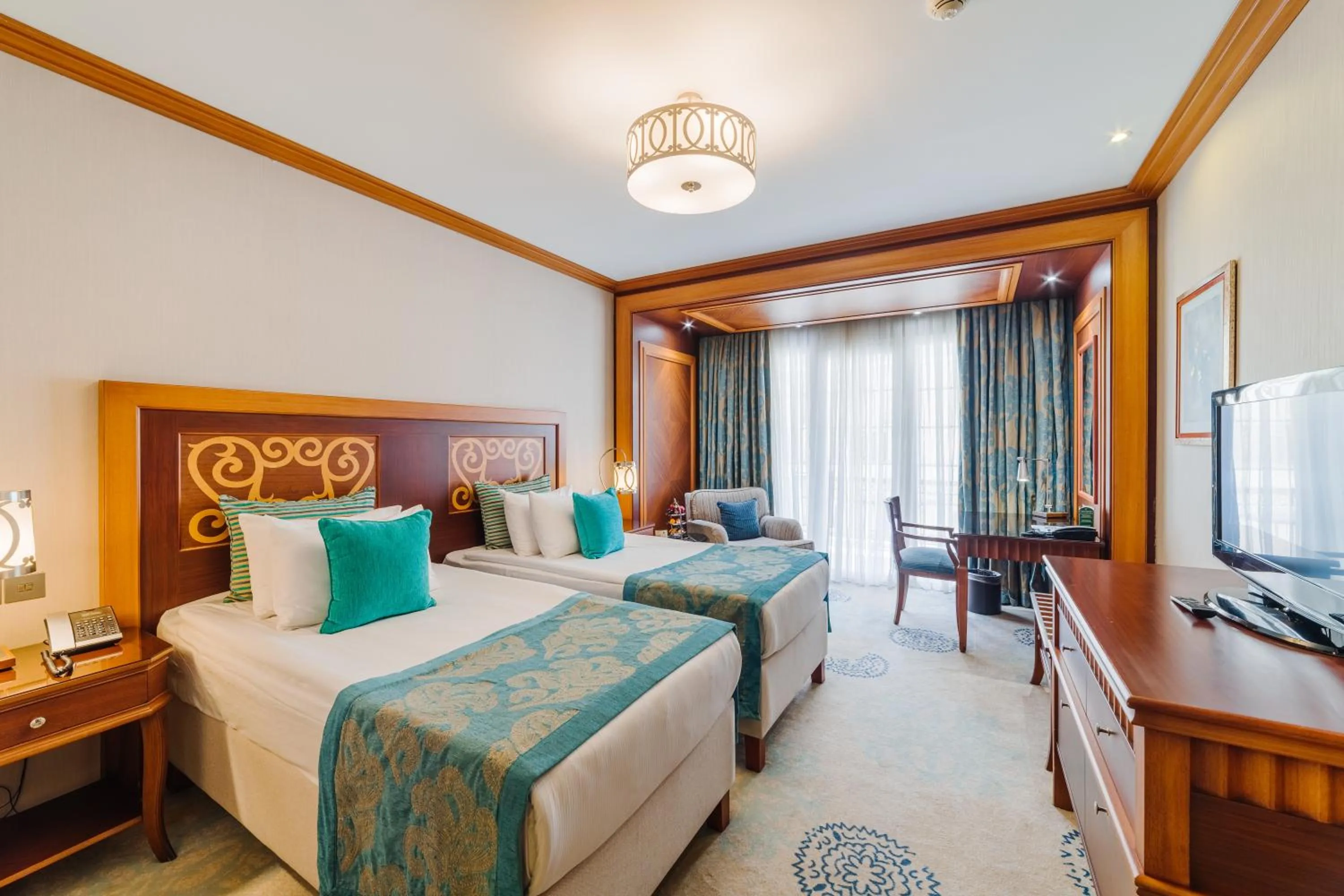 Bed in The Arkin Colony Hotel