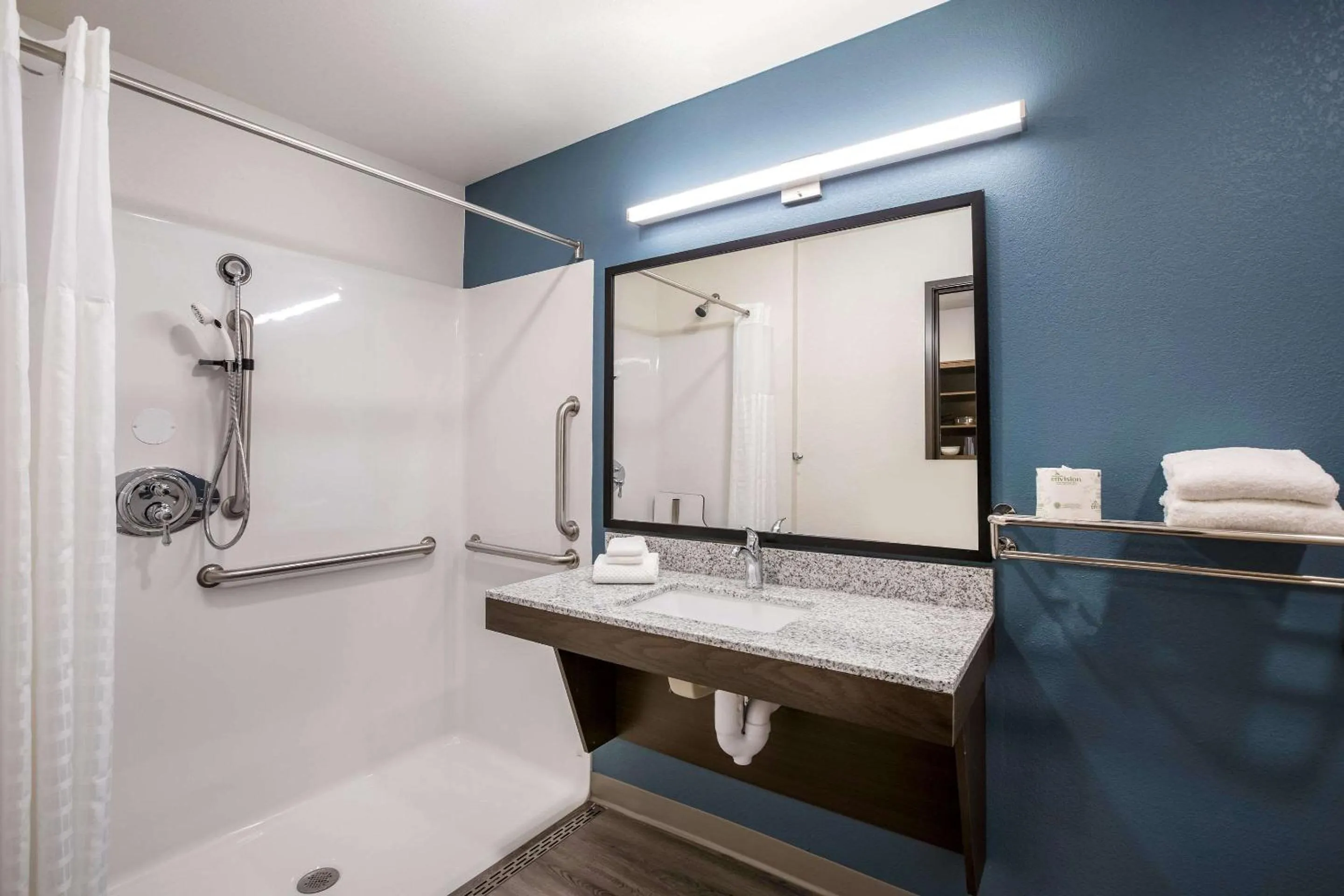 Shower in WoodSpring Suites Detroit Madison Heights