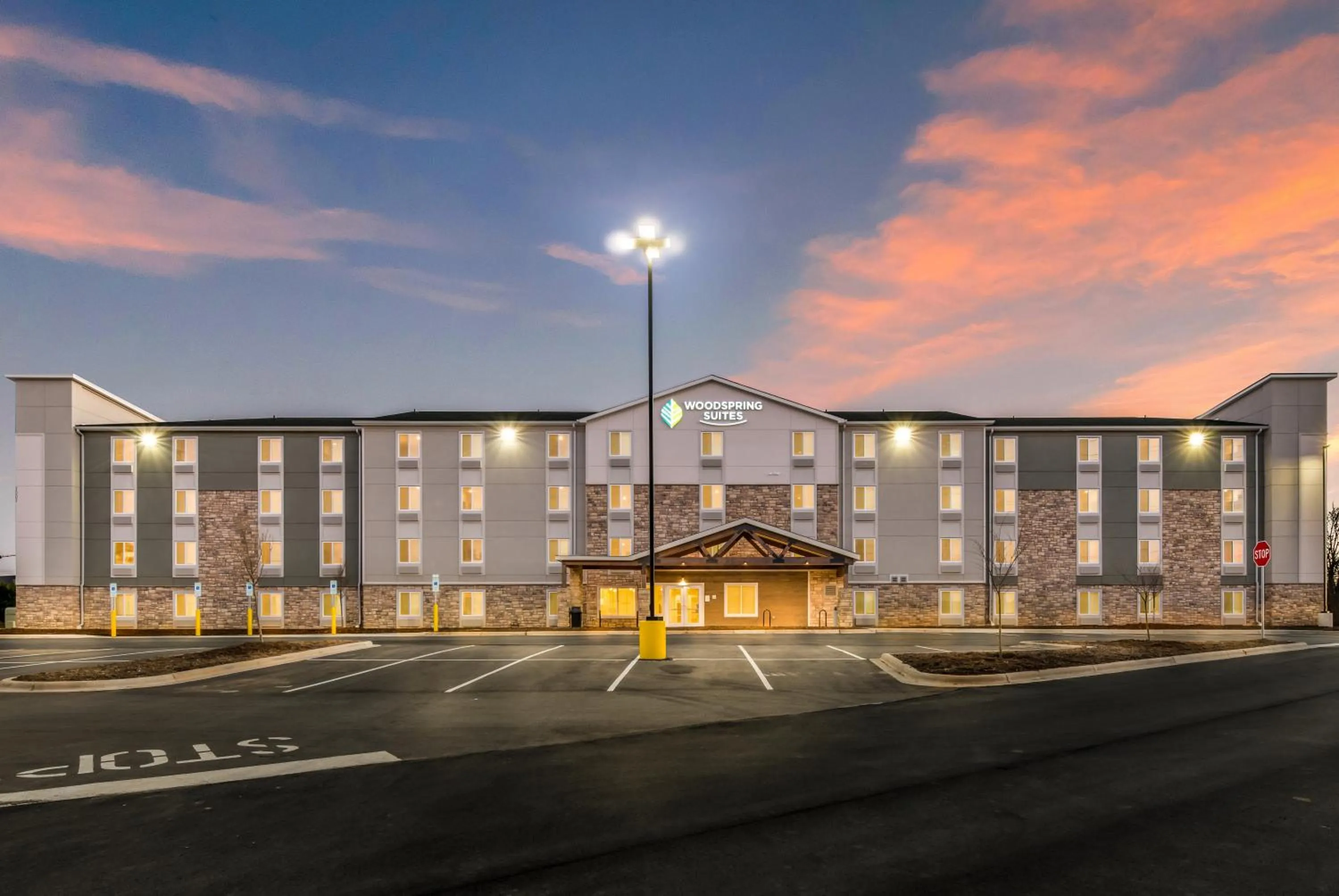 Property building in WoodSpring Suites Charlotte - University Research Park