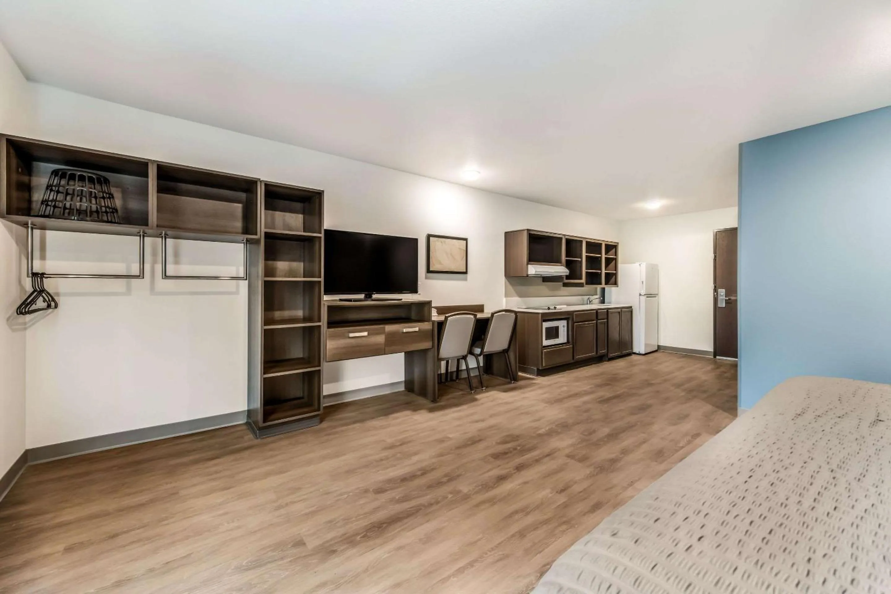 Photo of the whole room in WoodSpring Suites Charlotte - University Research Park