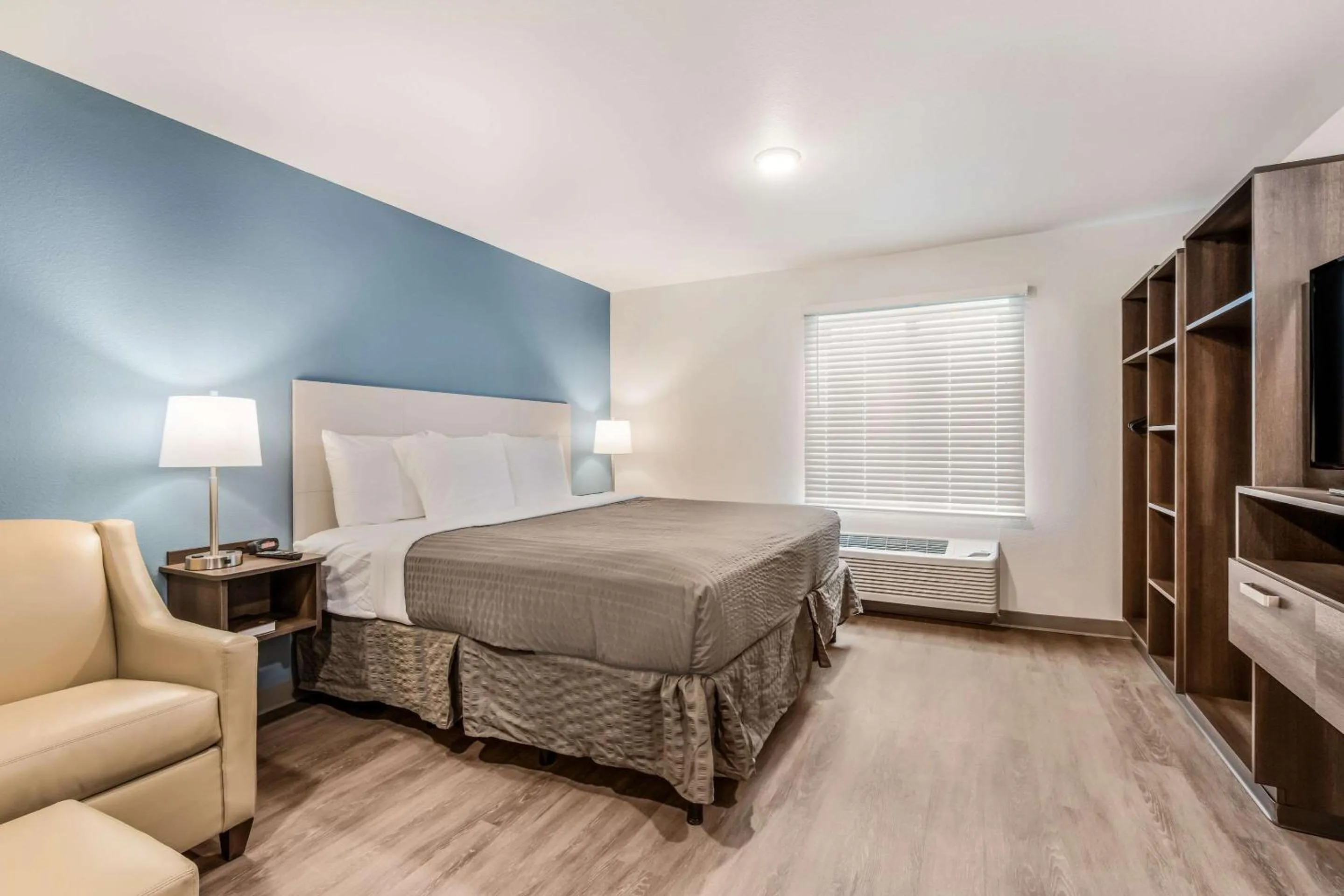 Photo of the whole room, Bed in WoodSpring Suites Charlotte - University Research Park