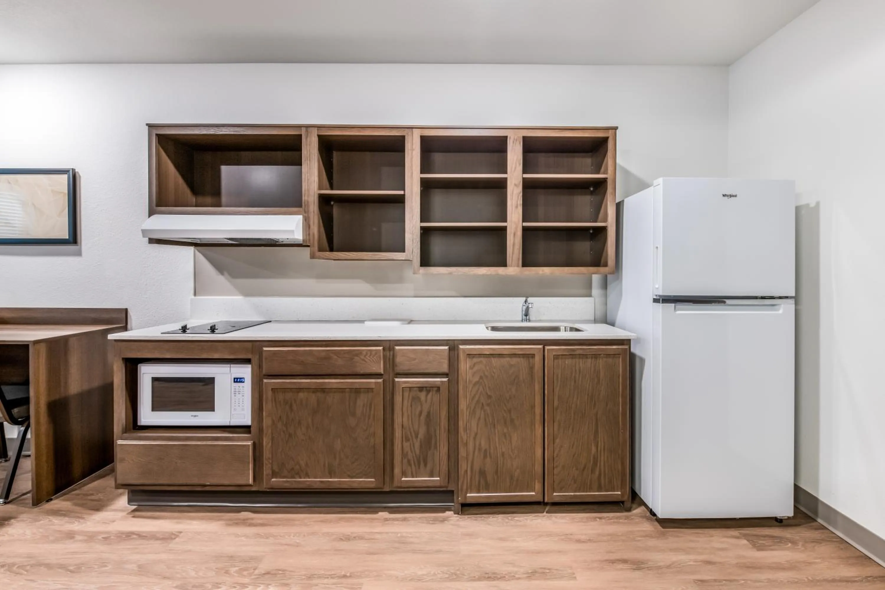 Kitchen or kitchenette in WoodSpring Suites Charlotte - University Research Park