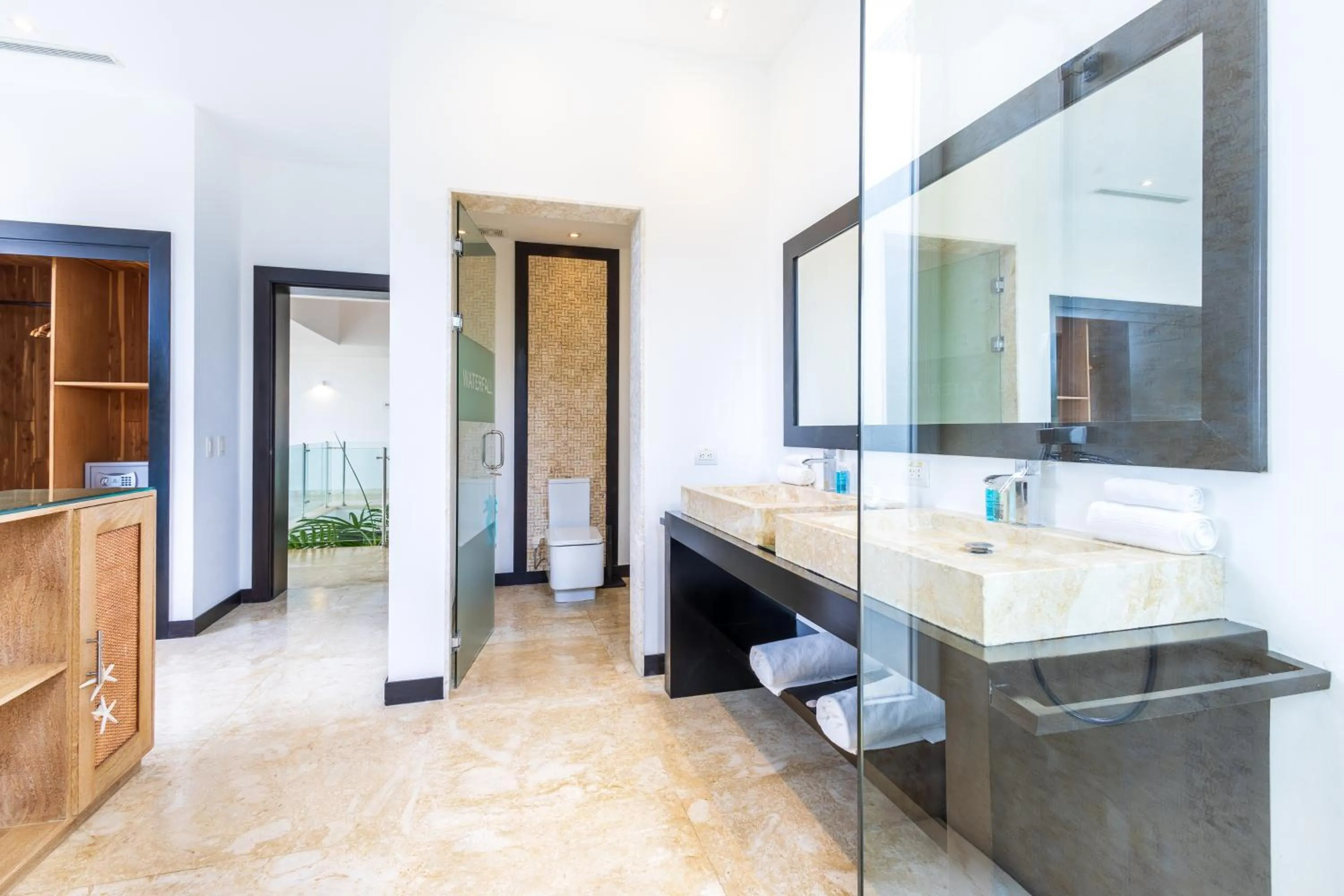 Toilet in Luxury Rentals in Punta Cana - Exclusive Waterfall Villa with Private Pool, BBQ, Maid, Golf