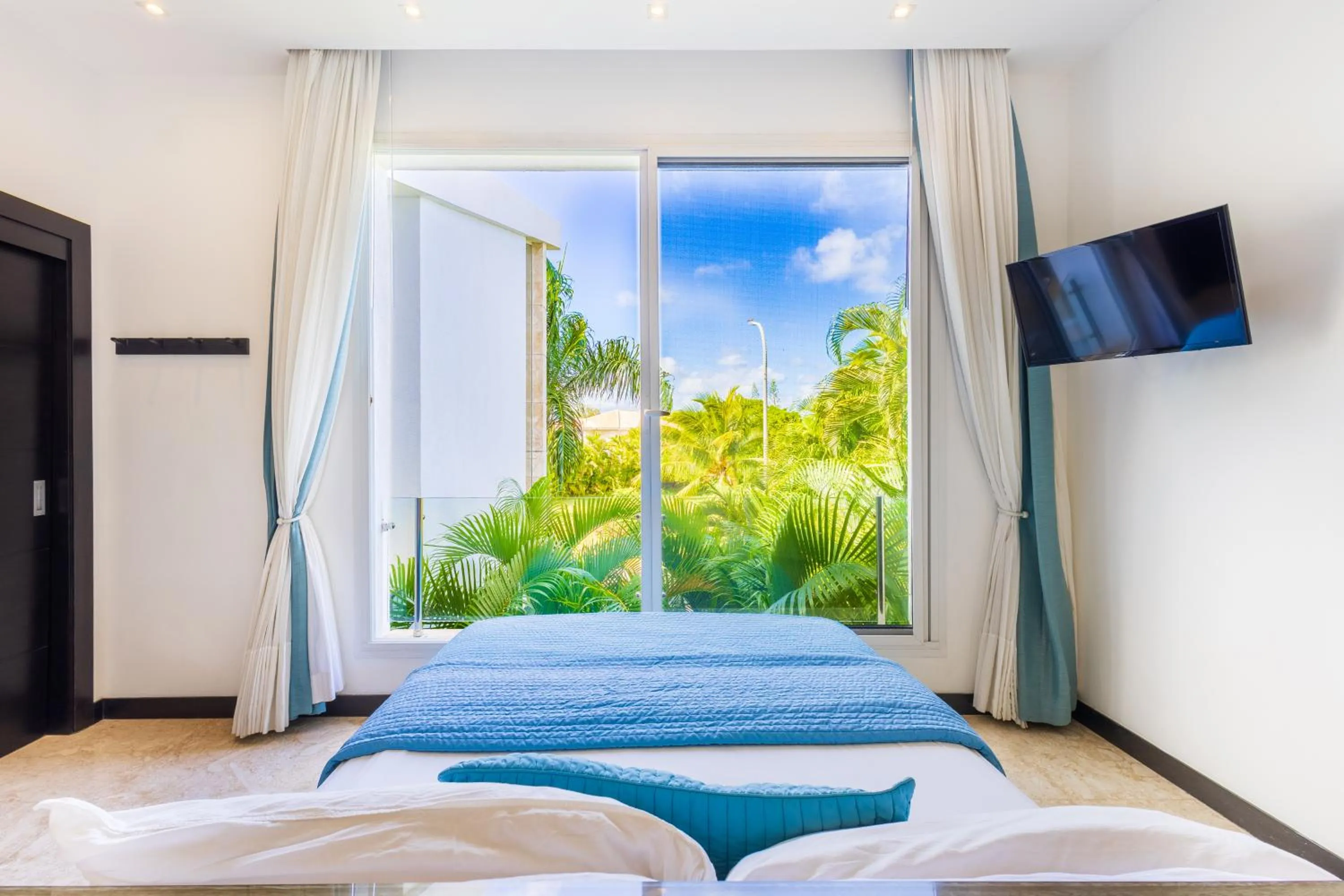 Bed in Luxury Rentals in Punta Cana - Exclusive Waterfall Villa with Private Pool, BBQ, Maid, Golf